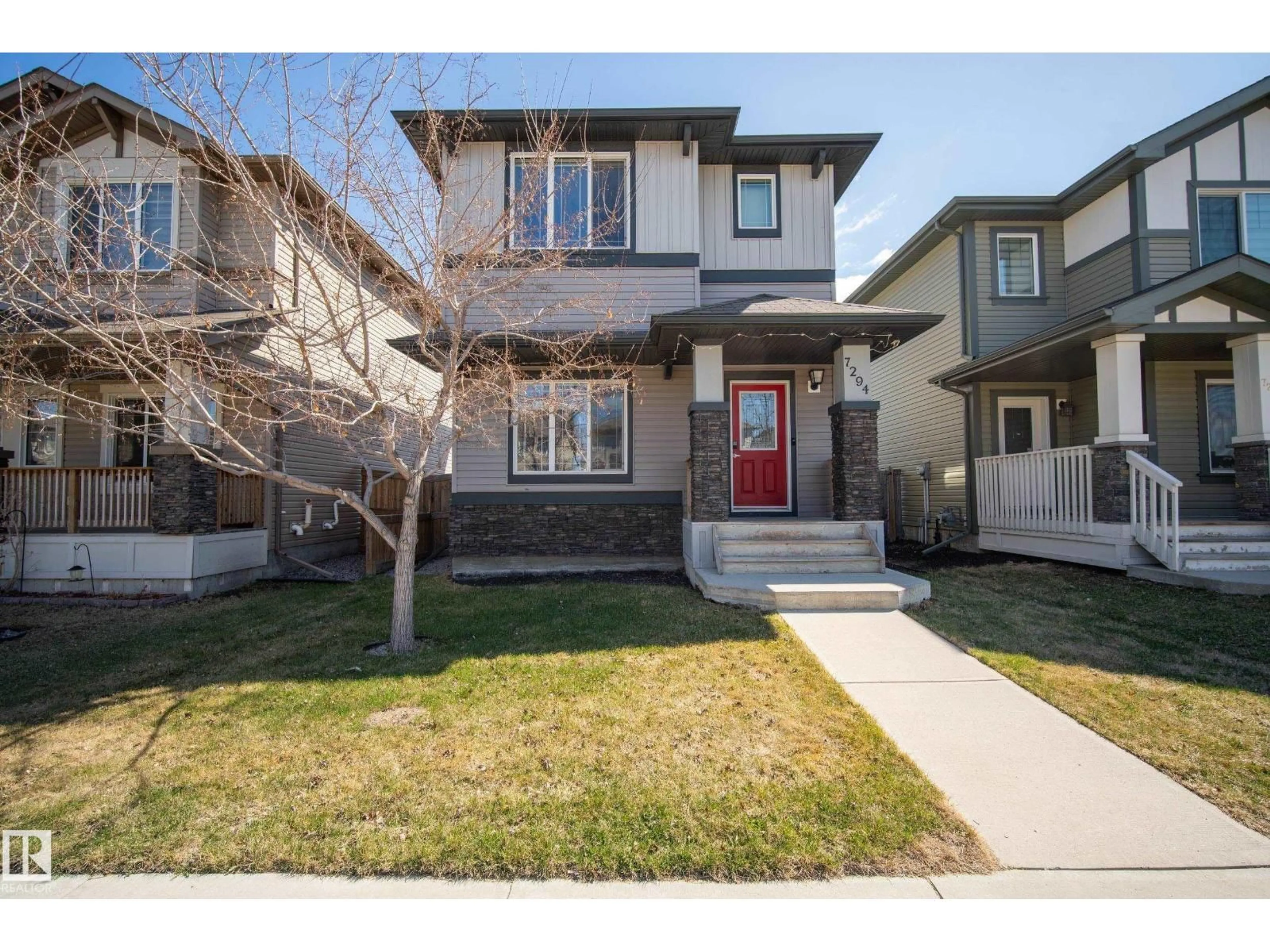 Home with vinyl exterior material, street for 7294 ARMOUR CR, Edmonton Alberta T6W2S2