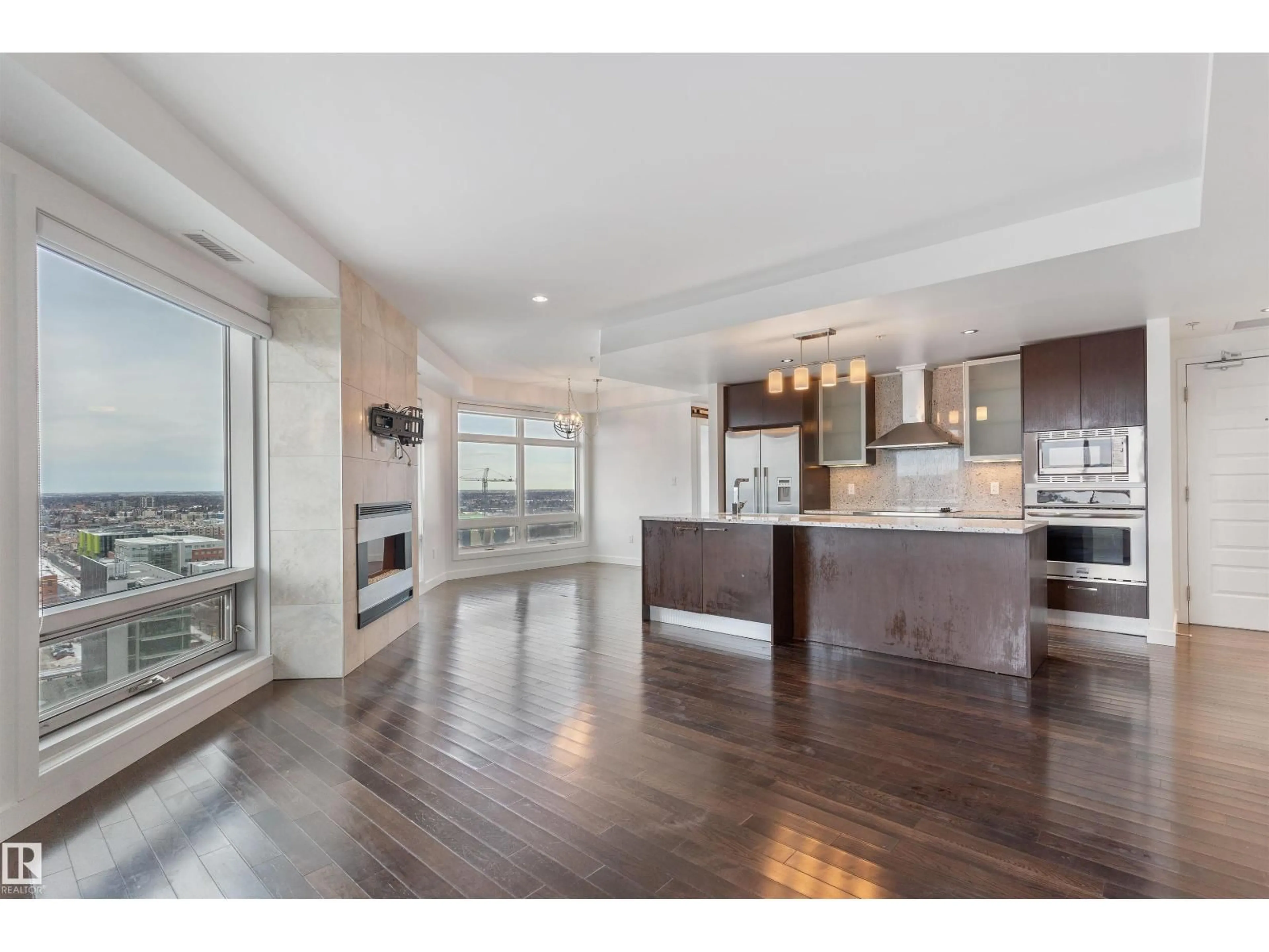 Open concept kitchen, wood/laminate floor for 10388 - 1901 105 ST, Edmonton Alberta T5J0C2