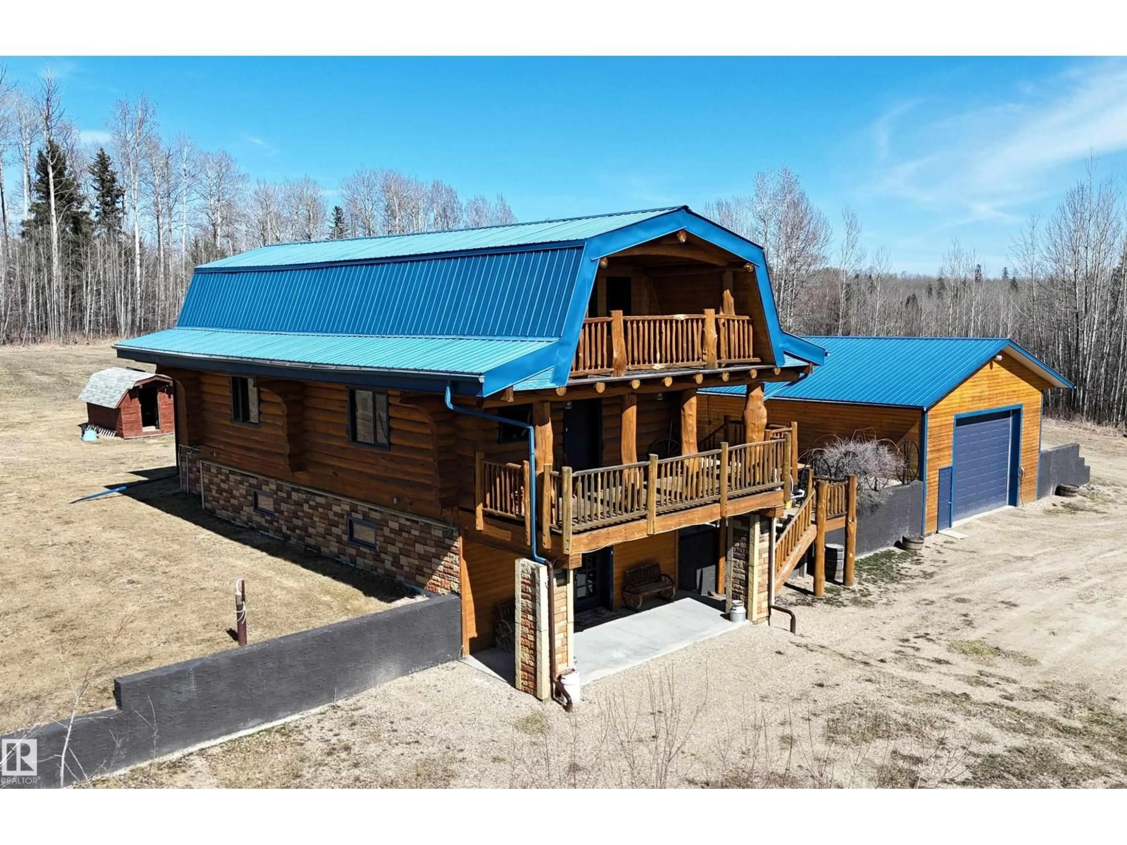 A pic from outside/outdoor area/front of a property/back of a property/a pic from drone, building for 18322B HWY 16 W, Rural Yellowhead Alberta T7E3B4