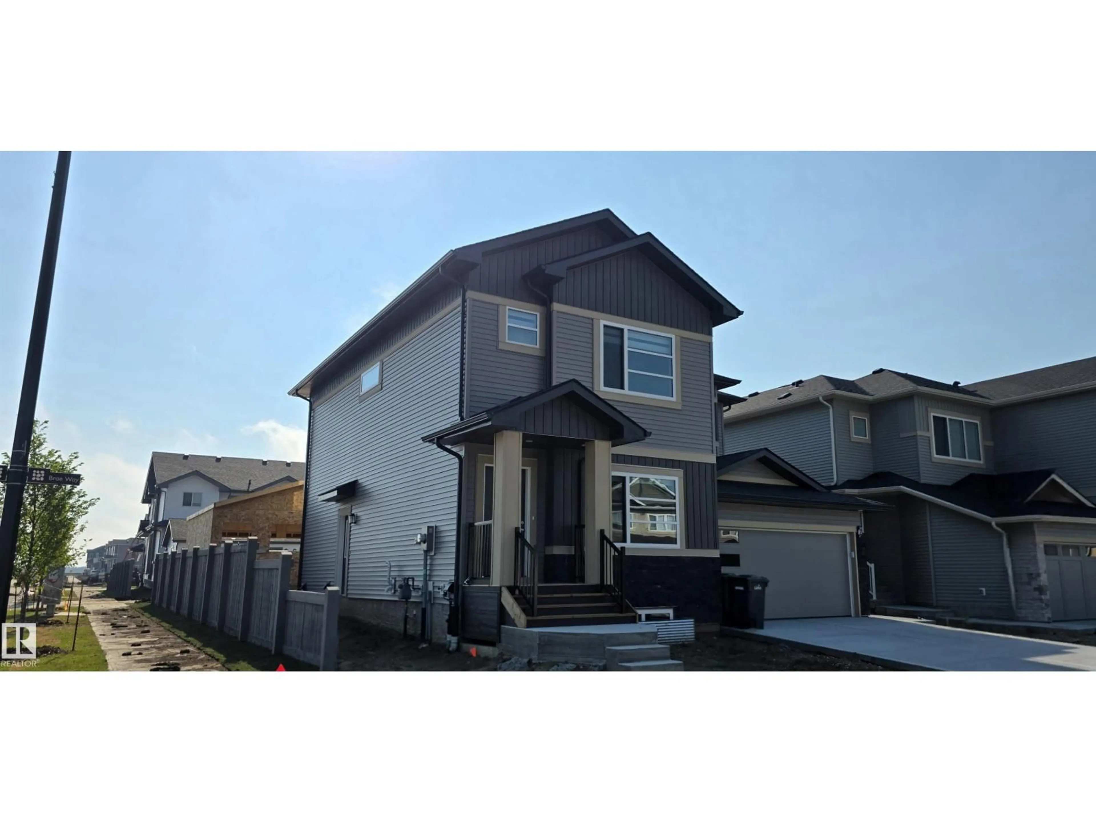 Home with vinyl exterior material, street for 301 BRAE WY, Leduc Alberta T9E1T7
