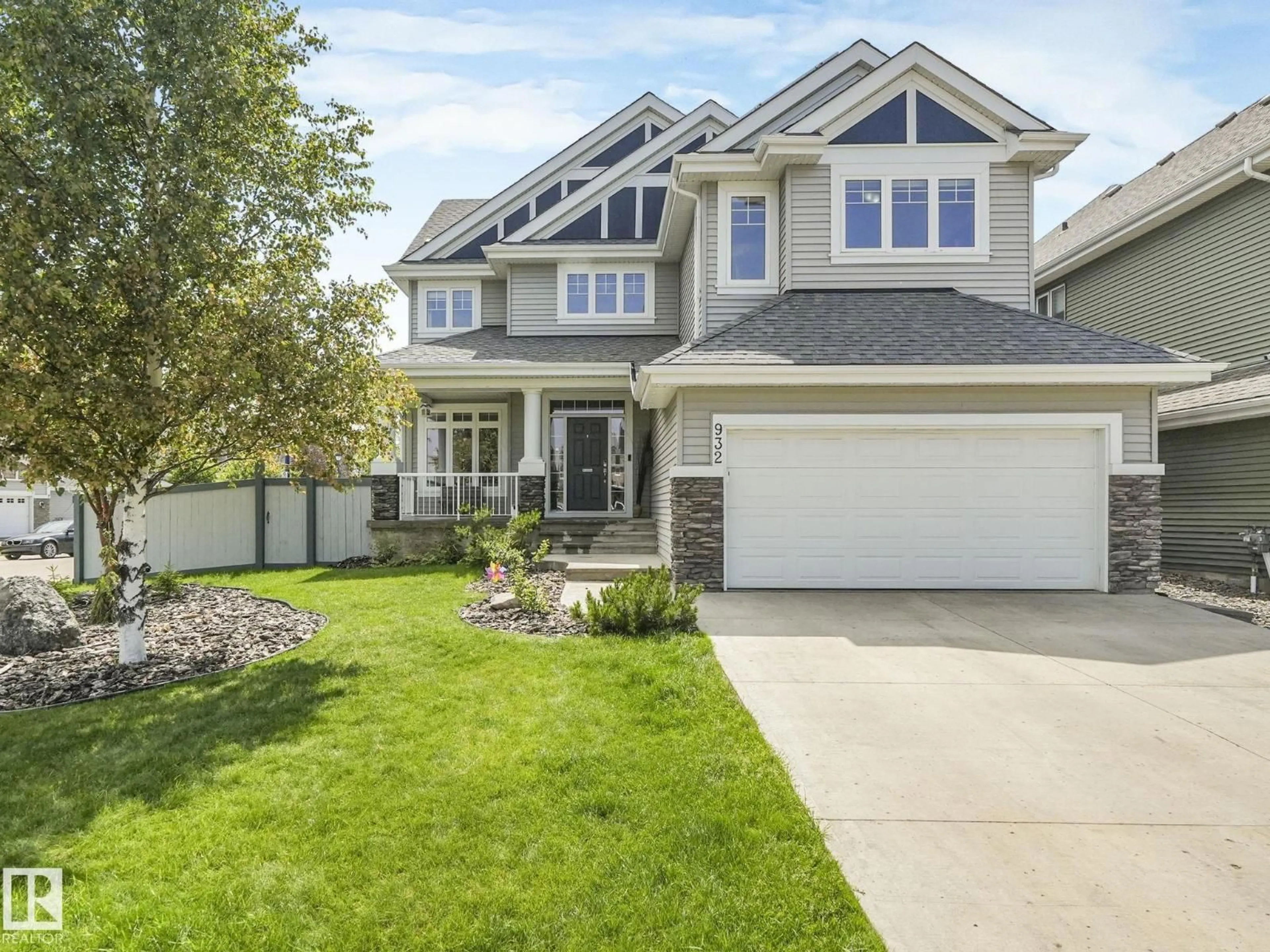 Home with vinyl exterior material, street for SW - 932 SUMMERSIDE LI, Edmonton Alberta T6X1B2