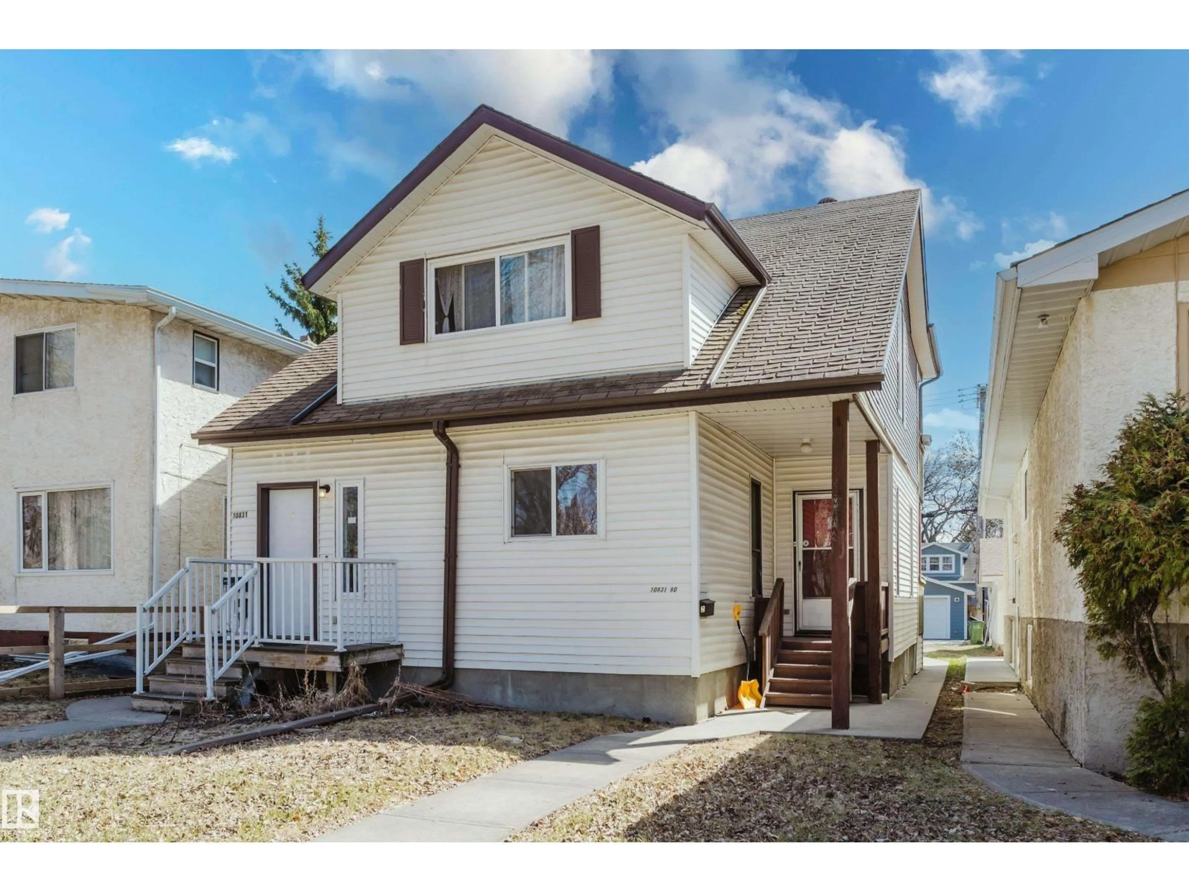 Home with vinyl exterior material, street for 10831 80 AV, Edmonton Alberta T6E1V9