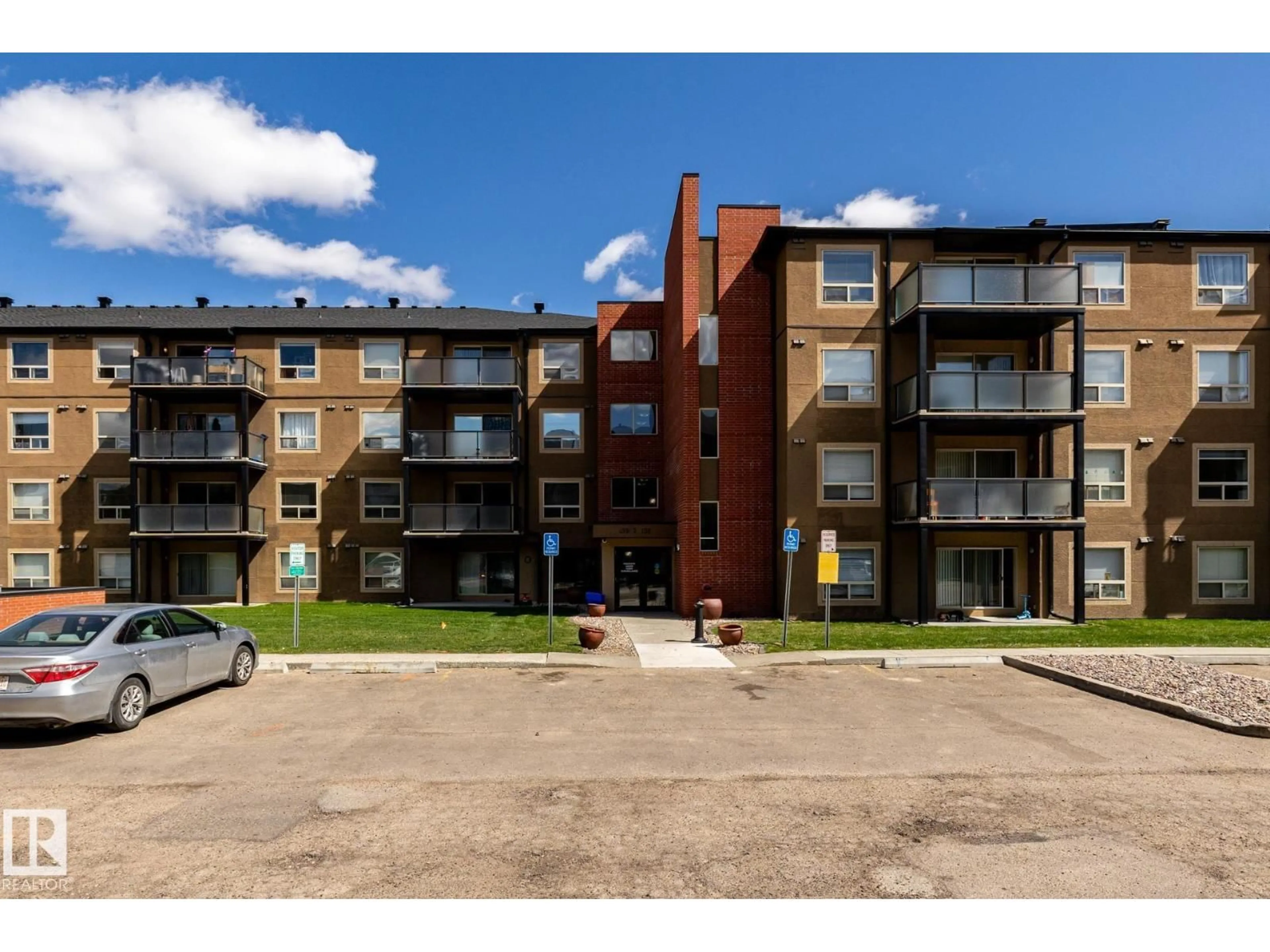 A pic from outside/outdoor area/front of a property/back of a property/a pic from drone, unknown for #214 - 13907 136 ST, Edmonton Alberta T6V1Y4