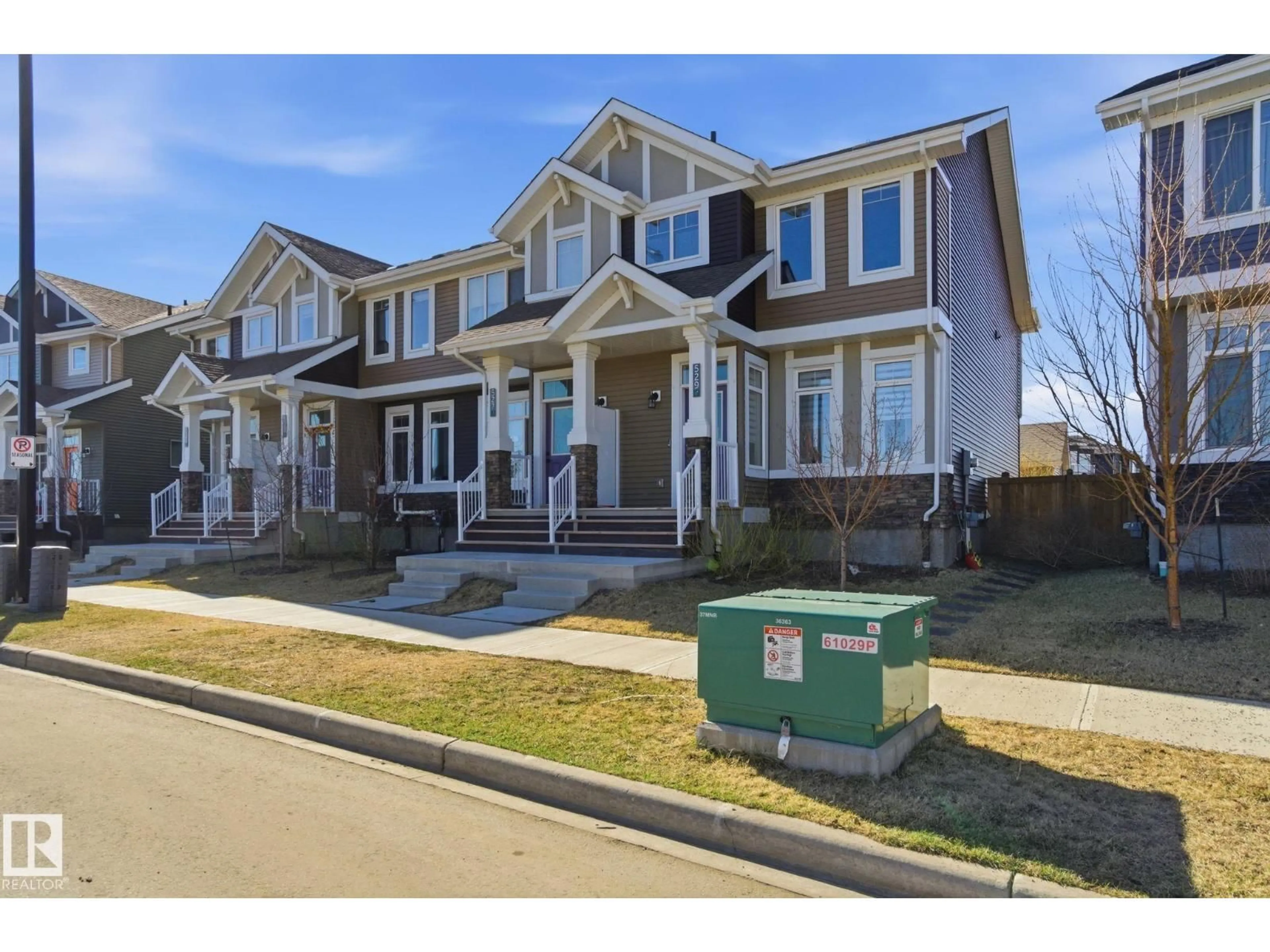Home with brick exterior material, street for 529 GLENRIDDING RAVINE DR, Edmonton Alberta T6W4P1