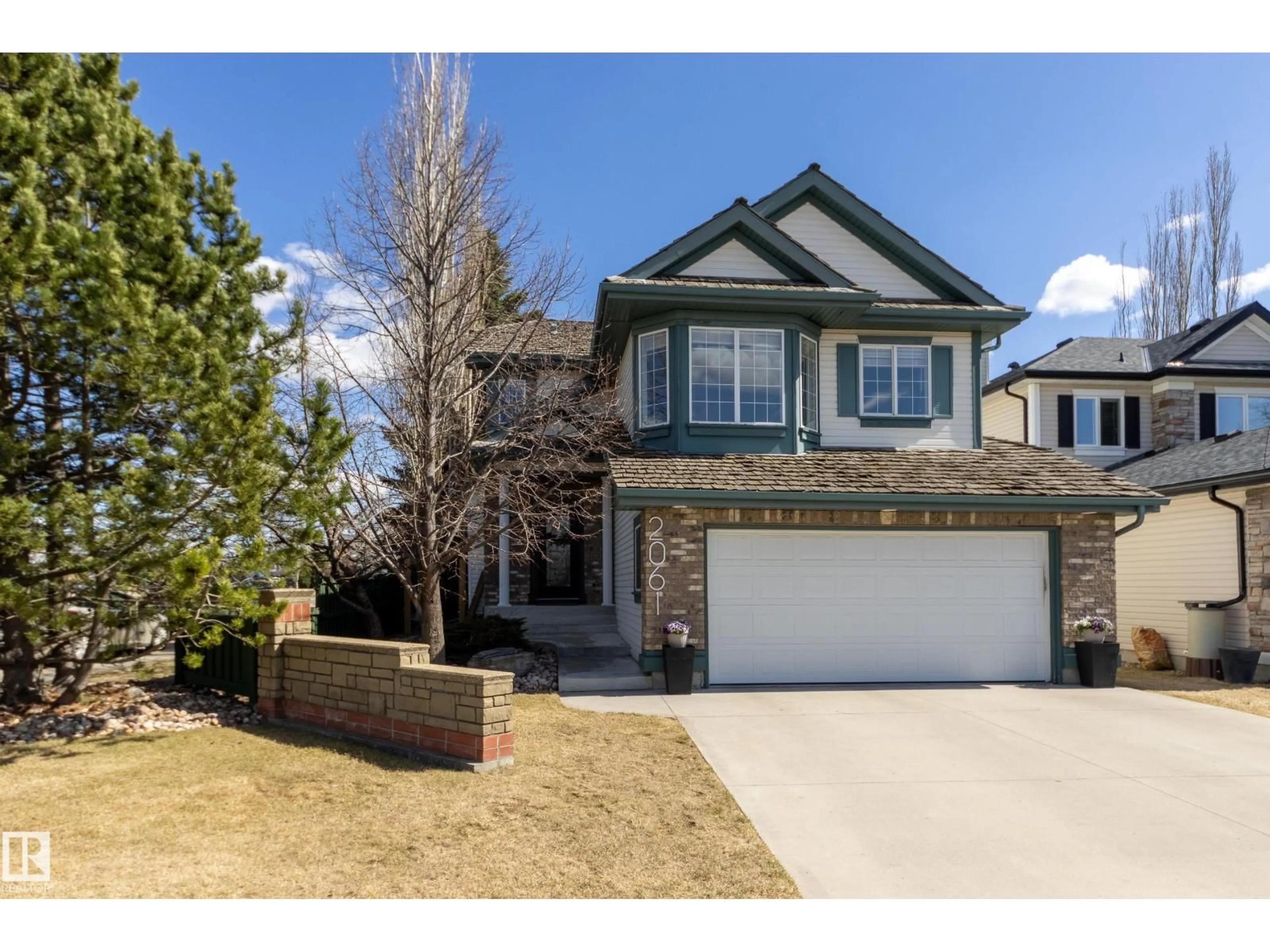 Home with vinyl exterior material, street for 2061 HADDOW DR, Edmonton Alberta T6R2X6
