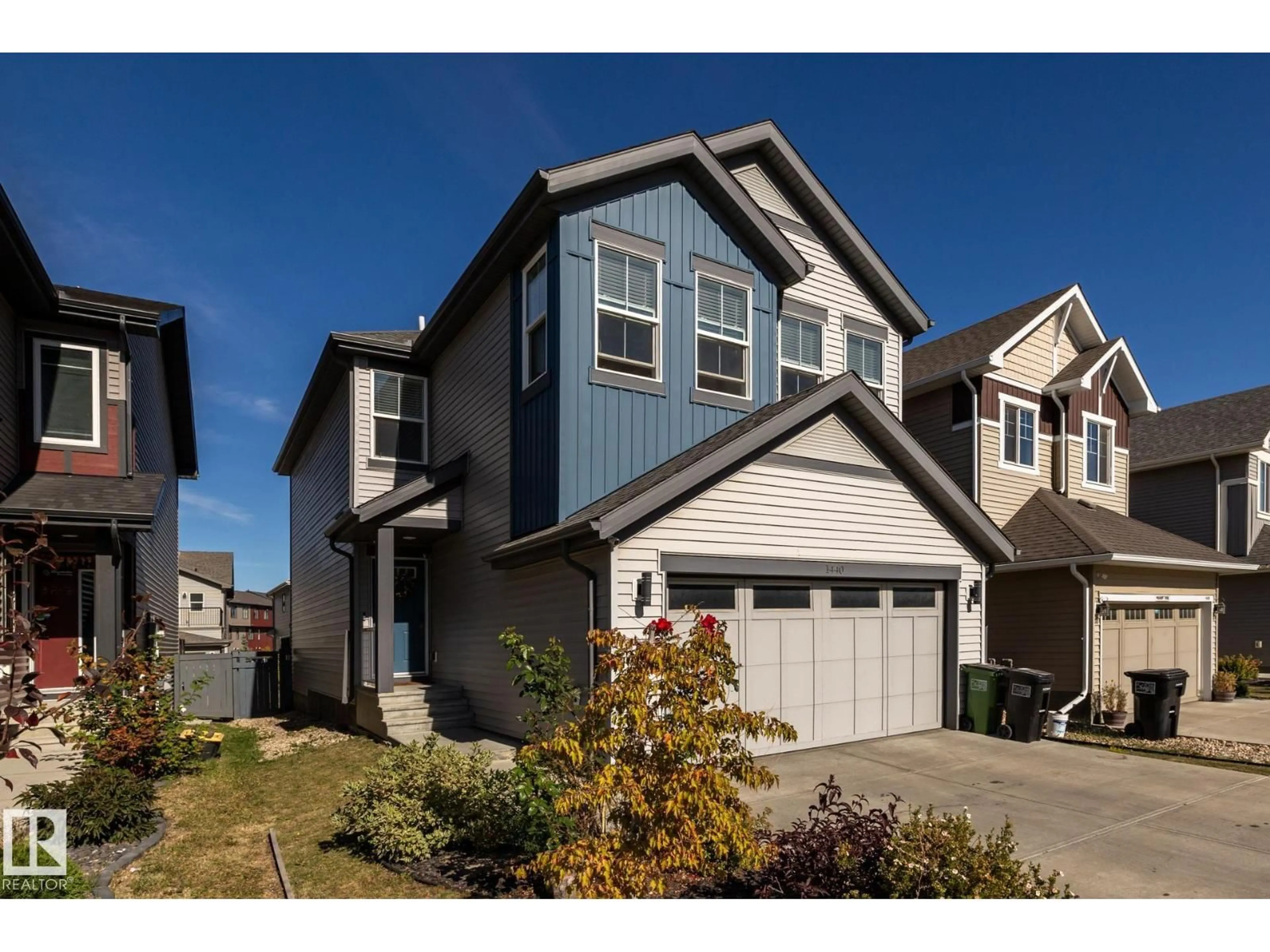 Home with vinyl exterior material, street for 1440 DARBY GREEN SW, Edmonton Alberta T6W4N5