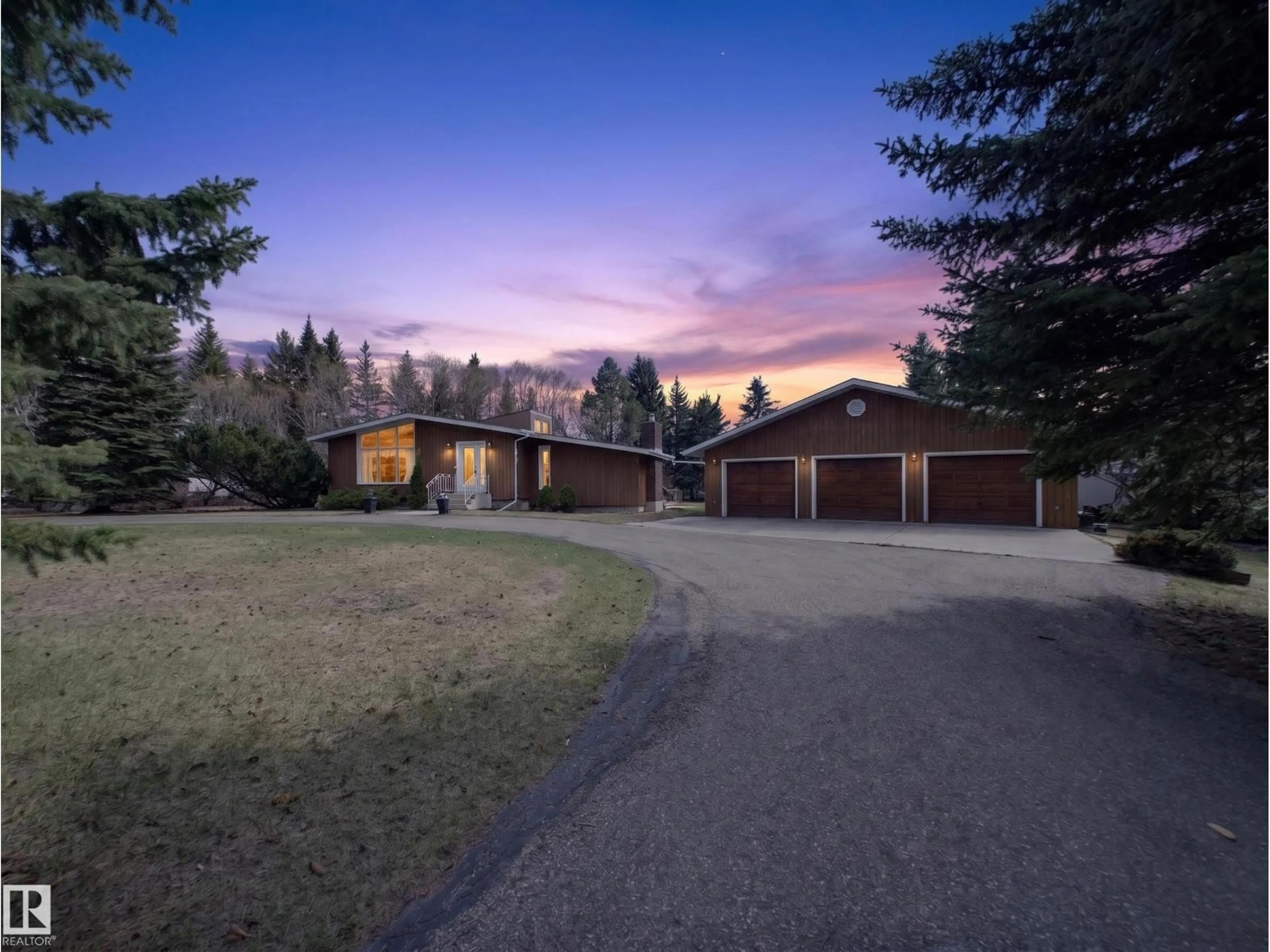 A pic from outside/outdoor area/front of a property/back of a property/a pic from drone, mountain view for 53279 - 109 RGE ROAD 225, Rural Strathcona County Alberta T8A4V1