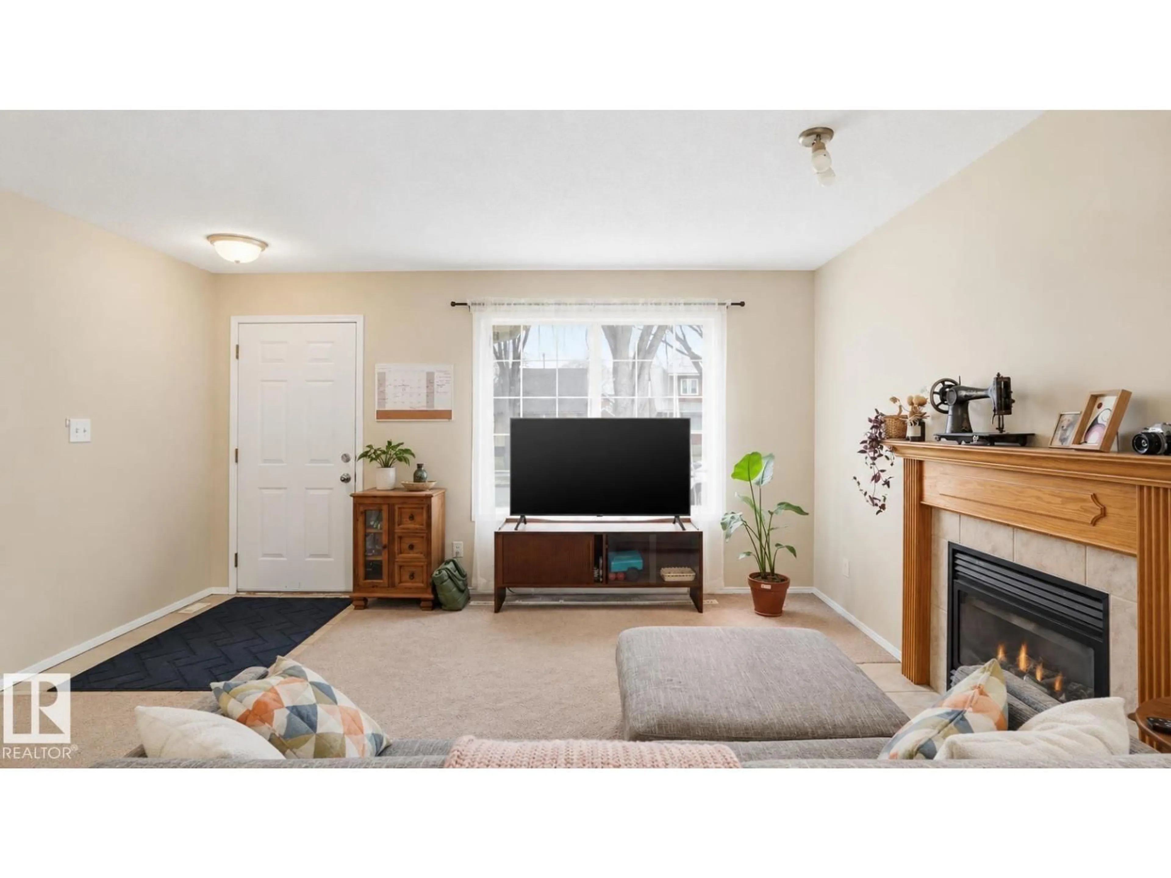 Living room with furniture, unknown for 9745 71 AV, Edmonton Alberta T6E0W5