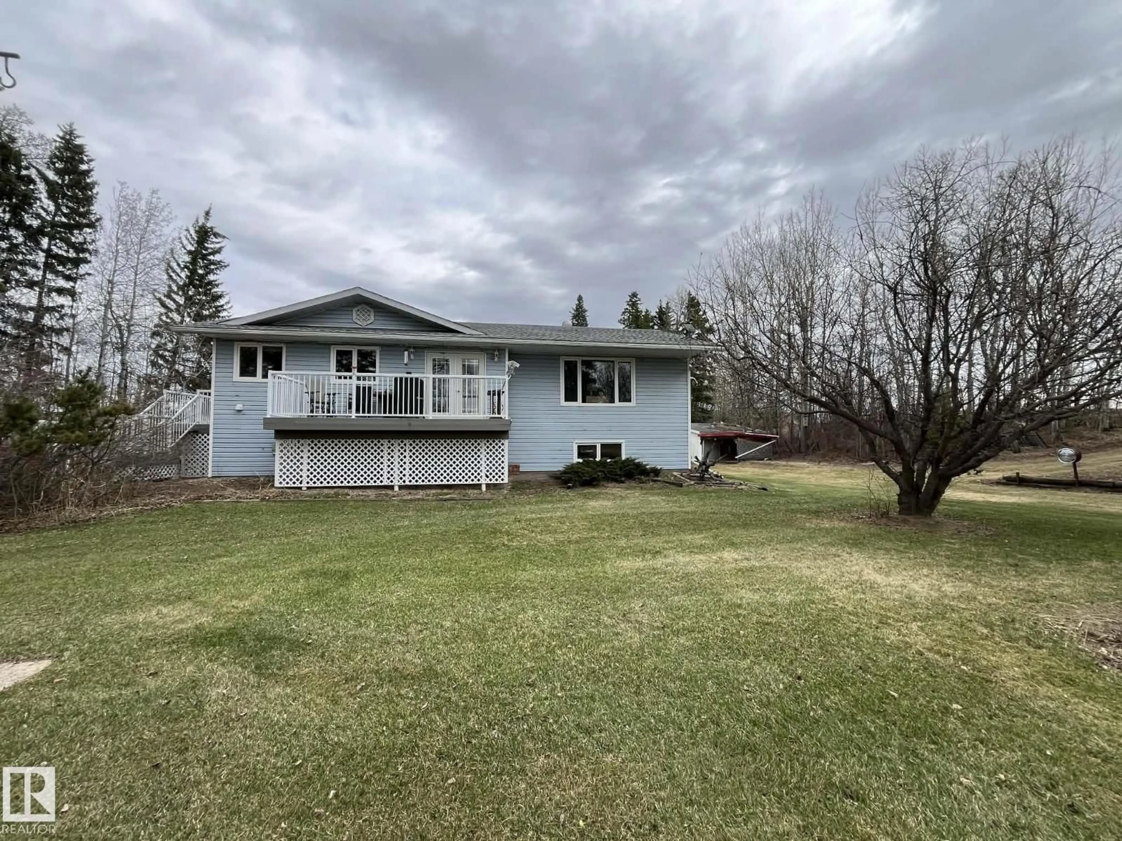 A pic from outside/outdoor area/front of a property/back of a property/a pic from drone, street for 57403 HWY 764, Rural Barrhead County Alberta T7N1N4