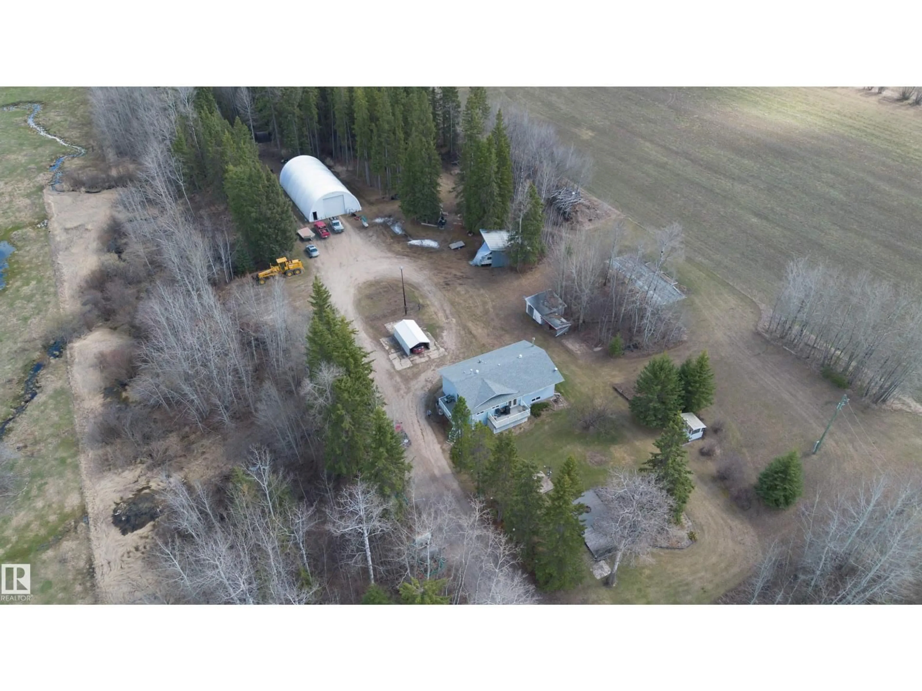 A pic from outside/outdoor area/front of a property/back of a property/a pic from drone, building for 57403 HWY 764, Rural Barrhead County Alberta T7N1N4
