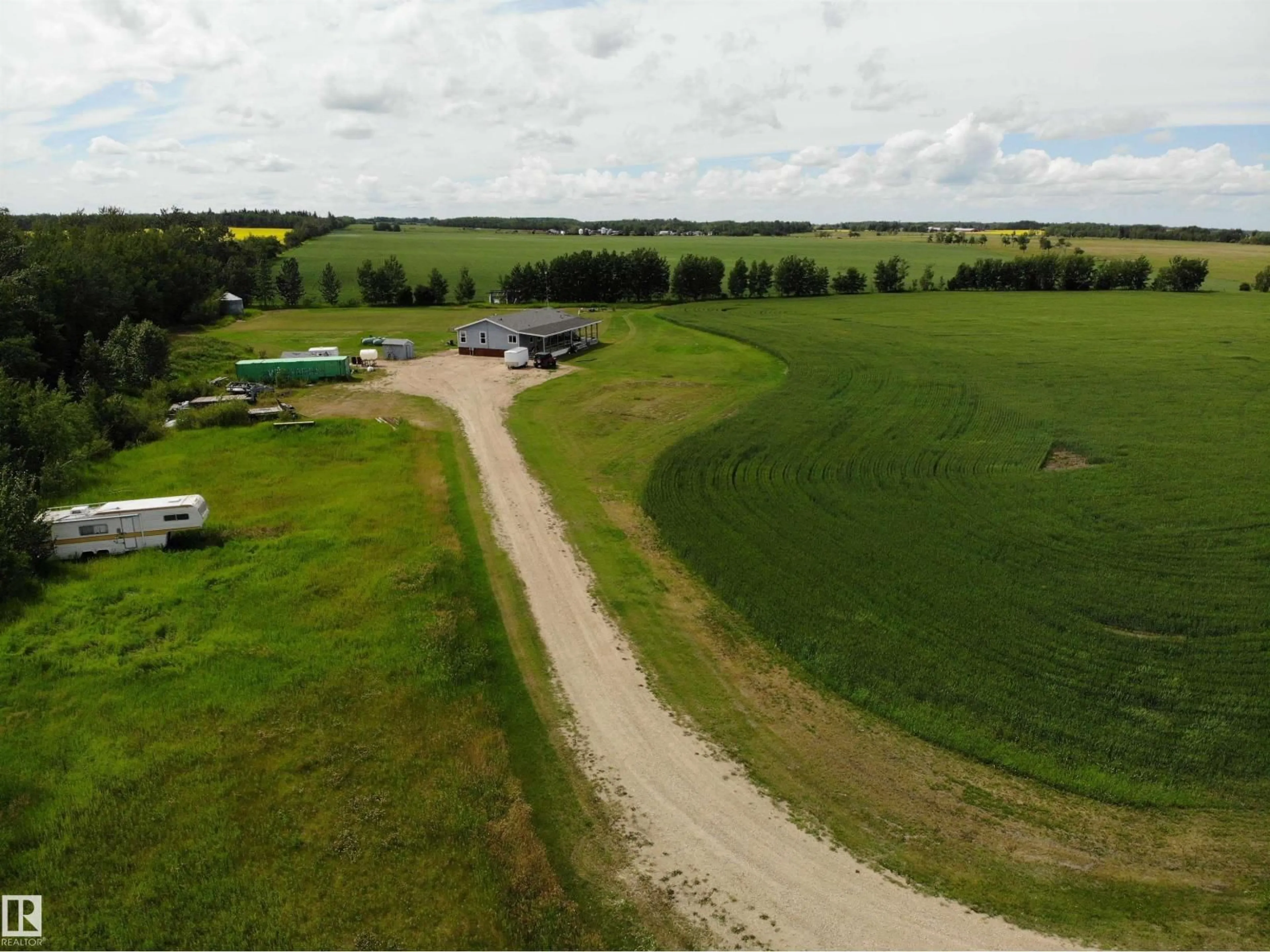 A pic from outside/outdoor area/front of a property/back of a property/a pic from drone, building for 27011 TWP RD 580, Rural Westlock County Alberta T0G0A6