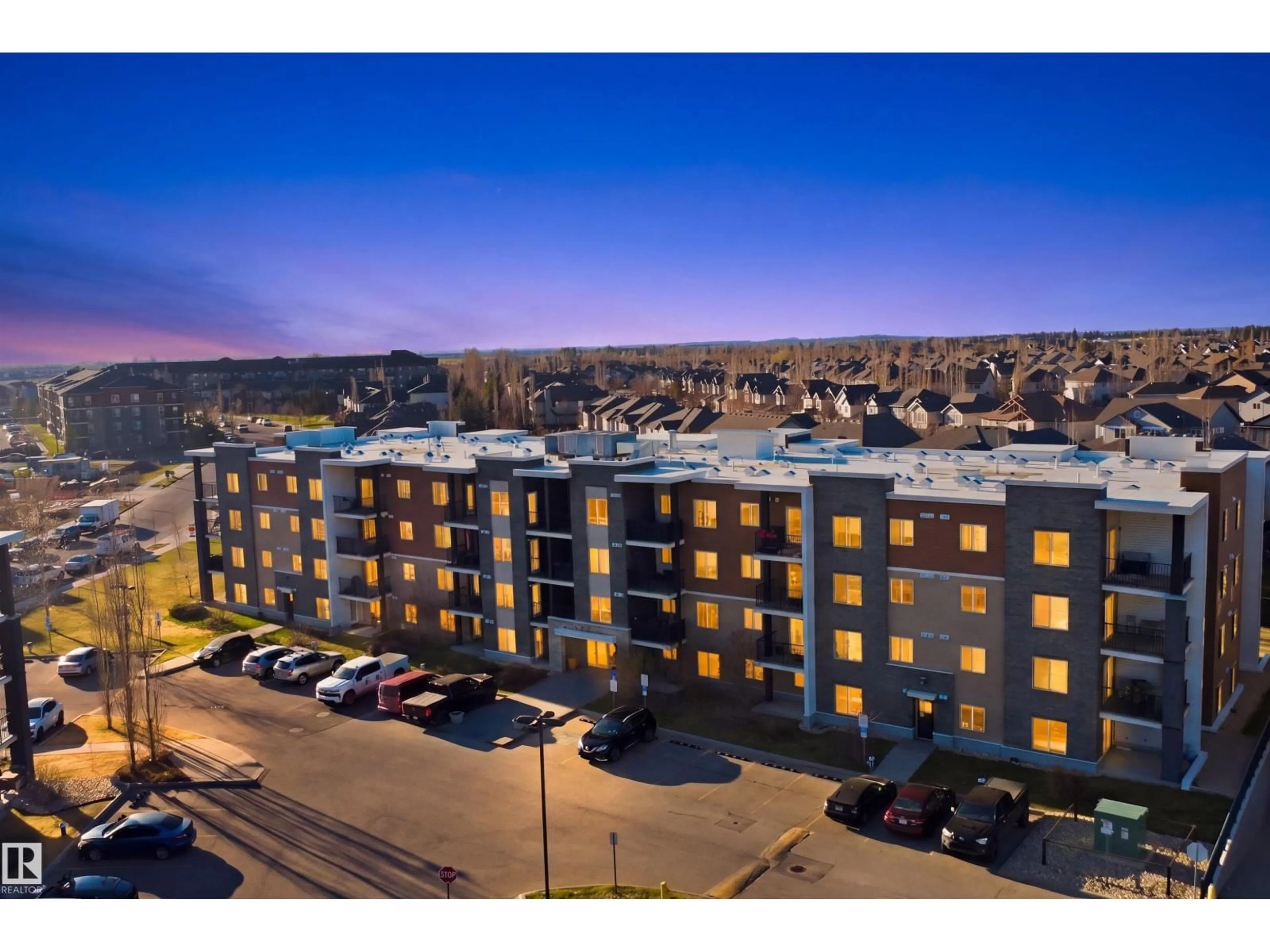 A pic from outside/outdoor area/front of a property/back of a property/a pic from drone, building for 205 - 205 11812 22 AVE AVE, Edmonton Alberta T6W2A2