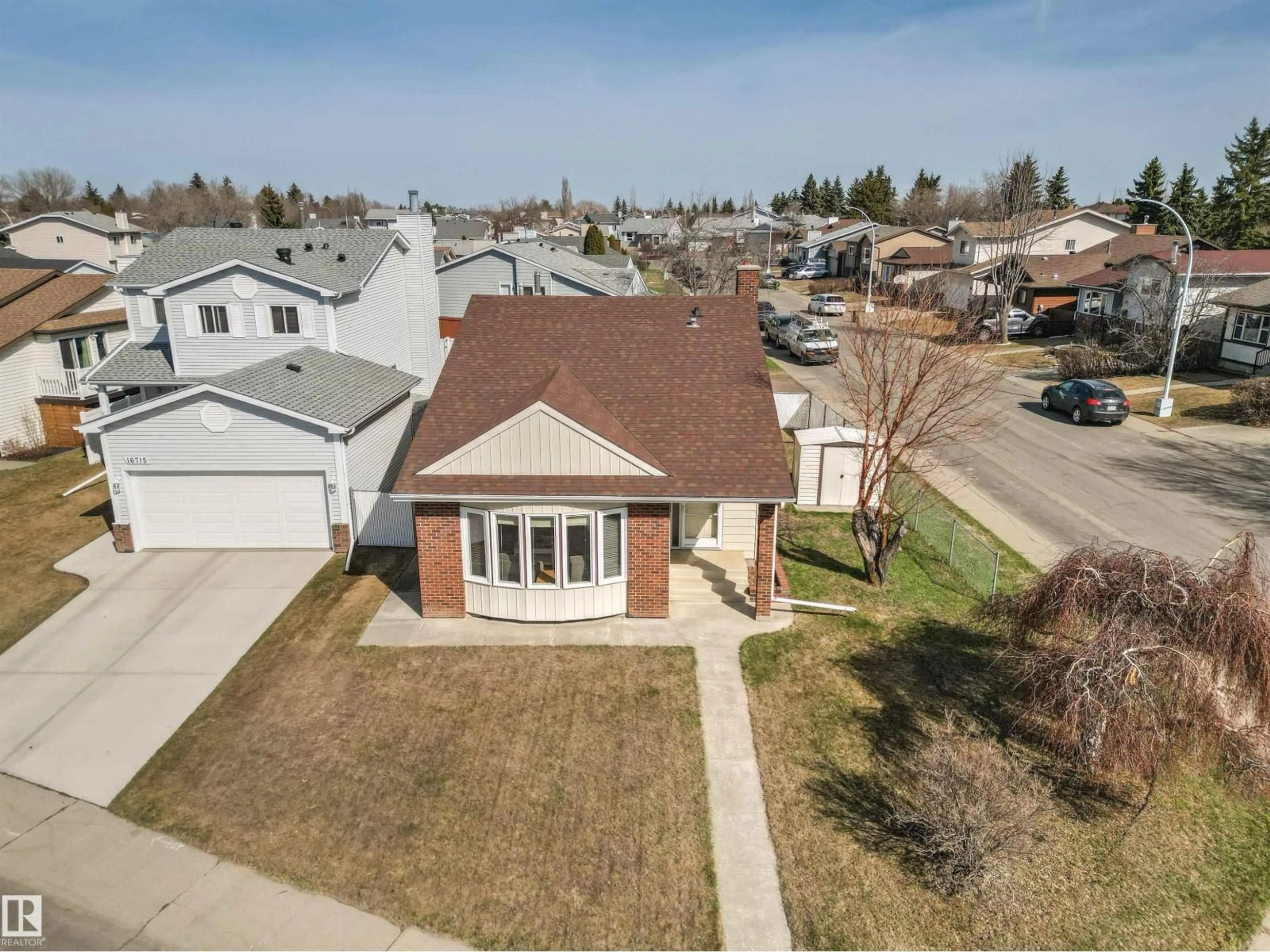 A pic from outside/outdoor area/front of a property/back of a property/a pic from drone, street for 16711 94 ST, Edmonton Alberta T5Z1Y1