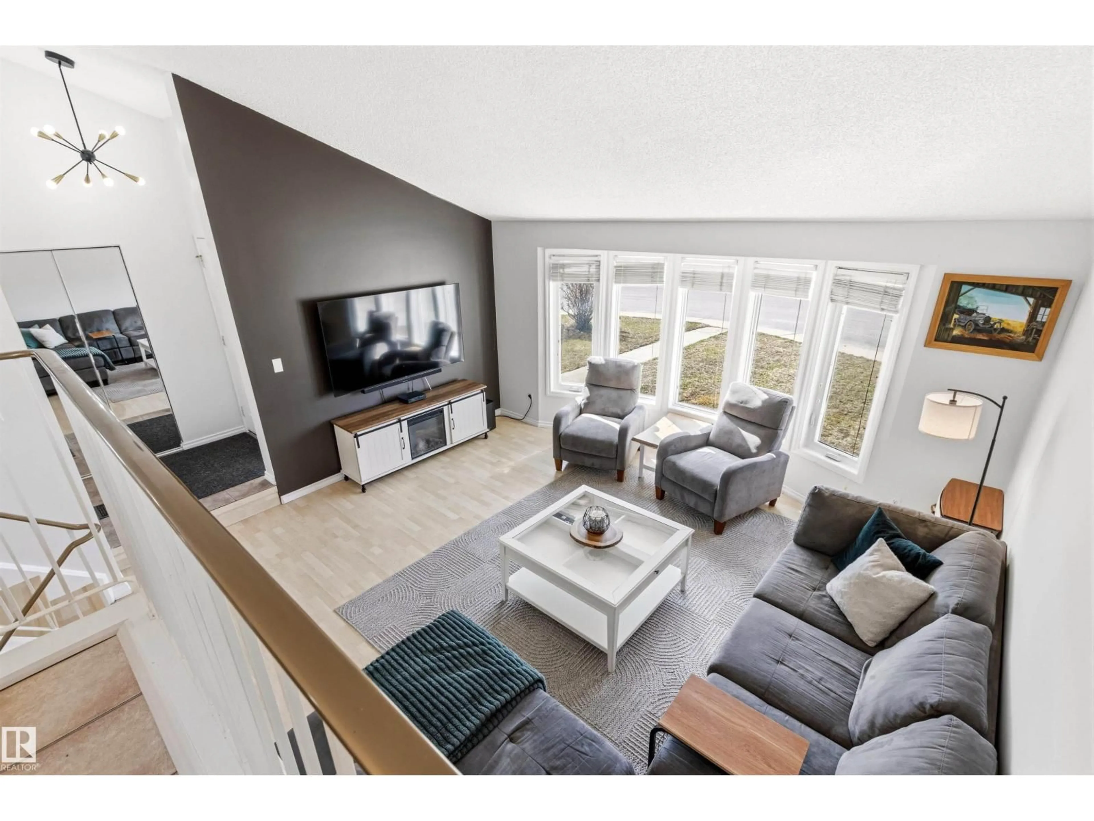 Living room with furniture, unknown for 16711 94 ST, Edmonton Alberta T5Z1Y1