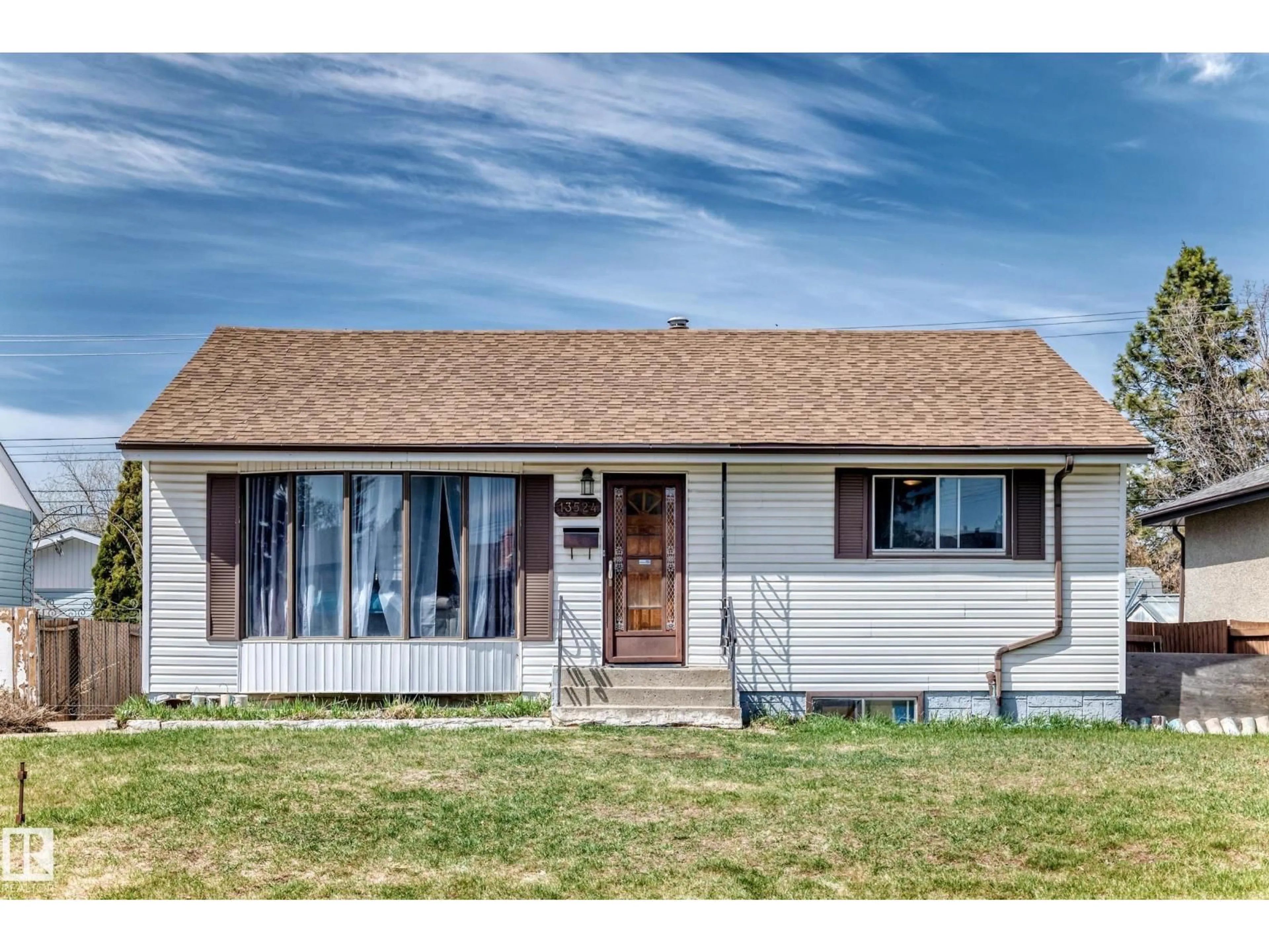 Home with vinyl exterior material, street for NW - 13524 123A ST, Edmonton Alberta T5L2Z2