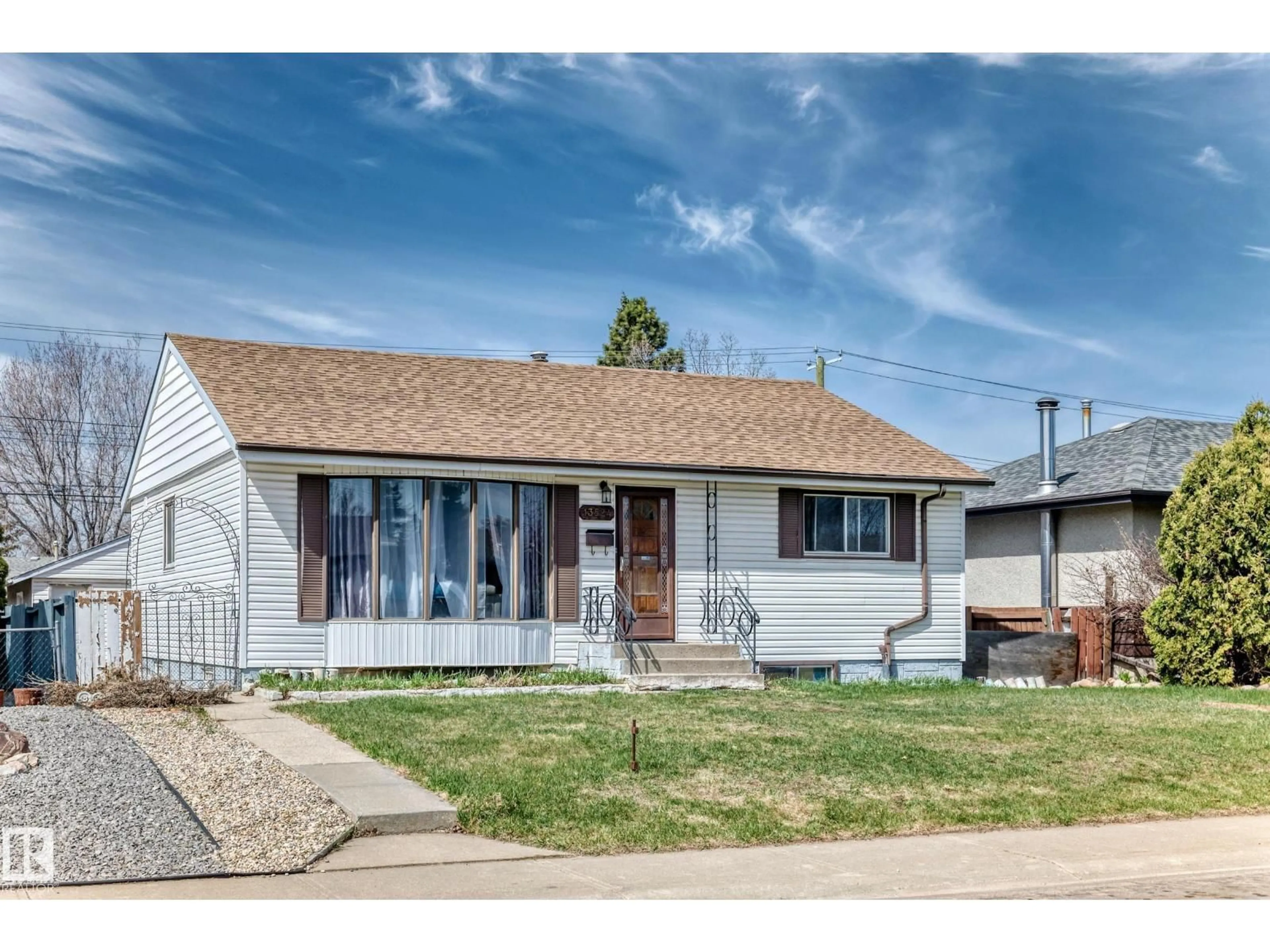 Home with vinyl exterior material, street for NW - 13524 123A ST, Edmonton Alberta T5L2Z2
