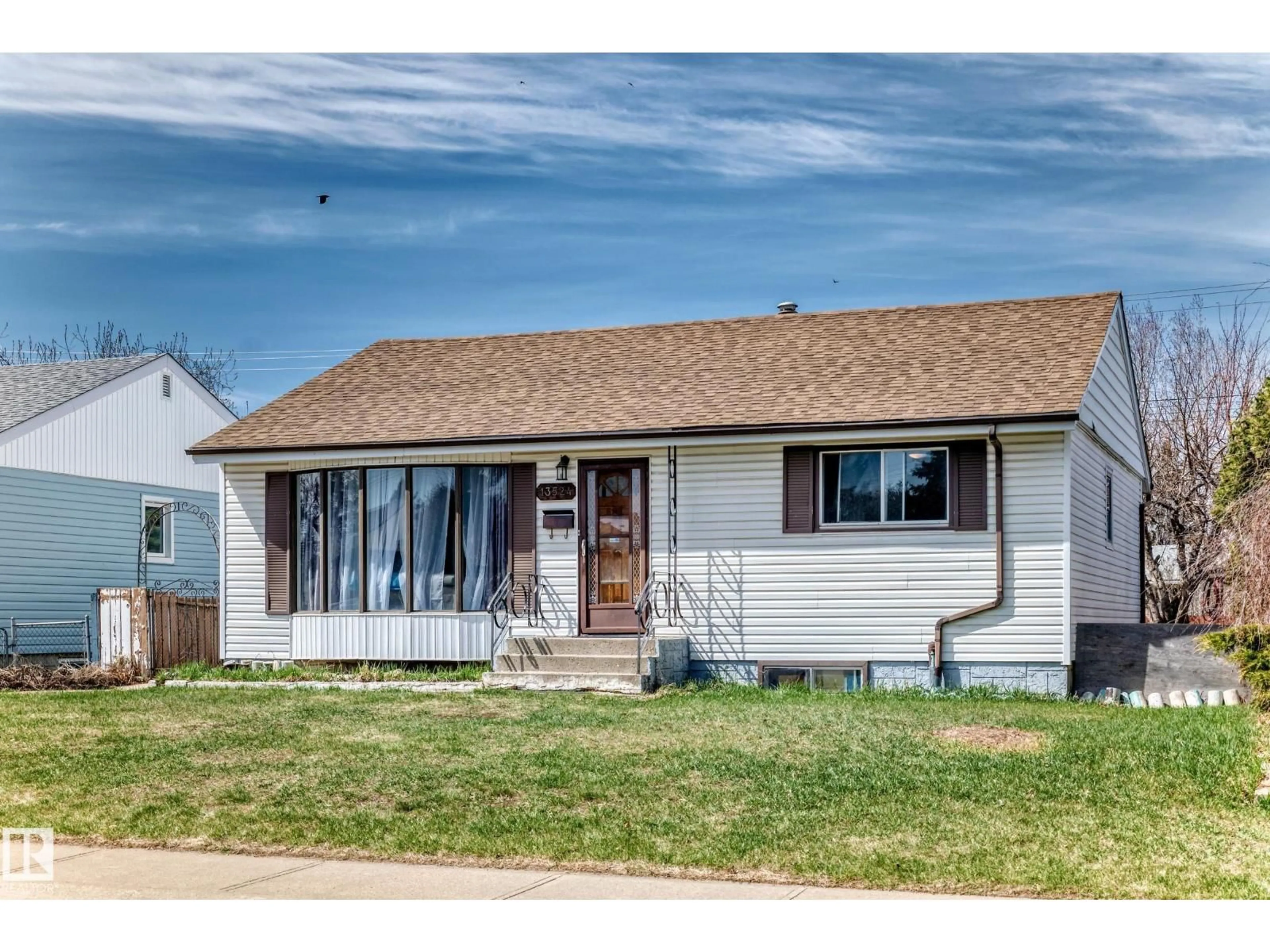 Home with vinyl exterior material, street for NW - 13524 123A ST, Edmonton Alberta T5L2Z2