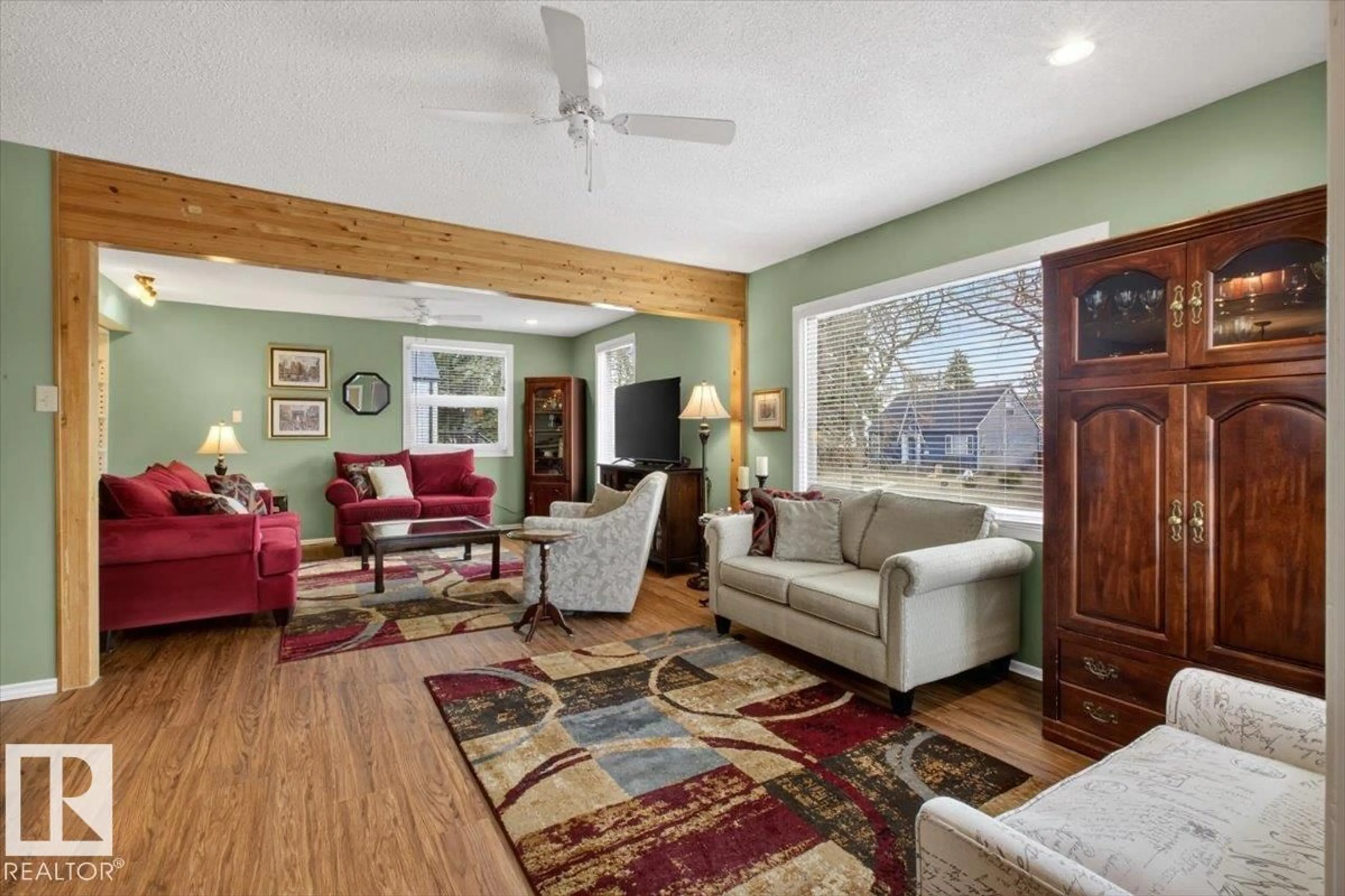 Living room with furniture, unknown for NW - 11302 58 ST, Edmonton Alberta T5W3W5