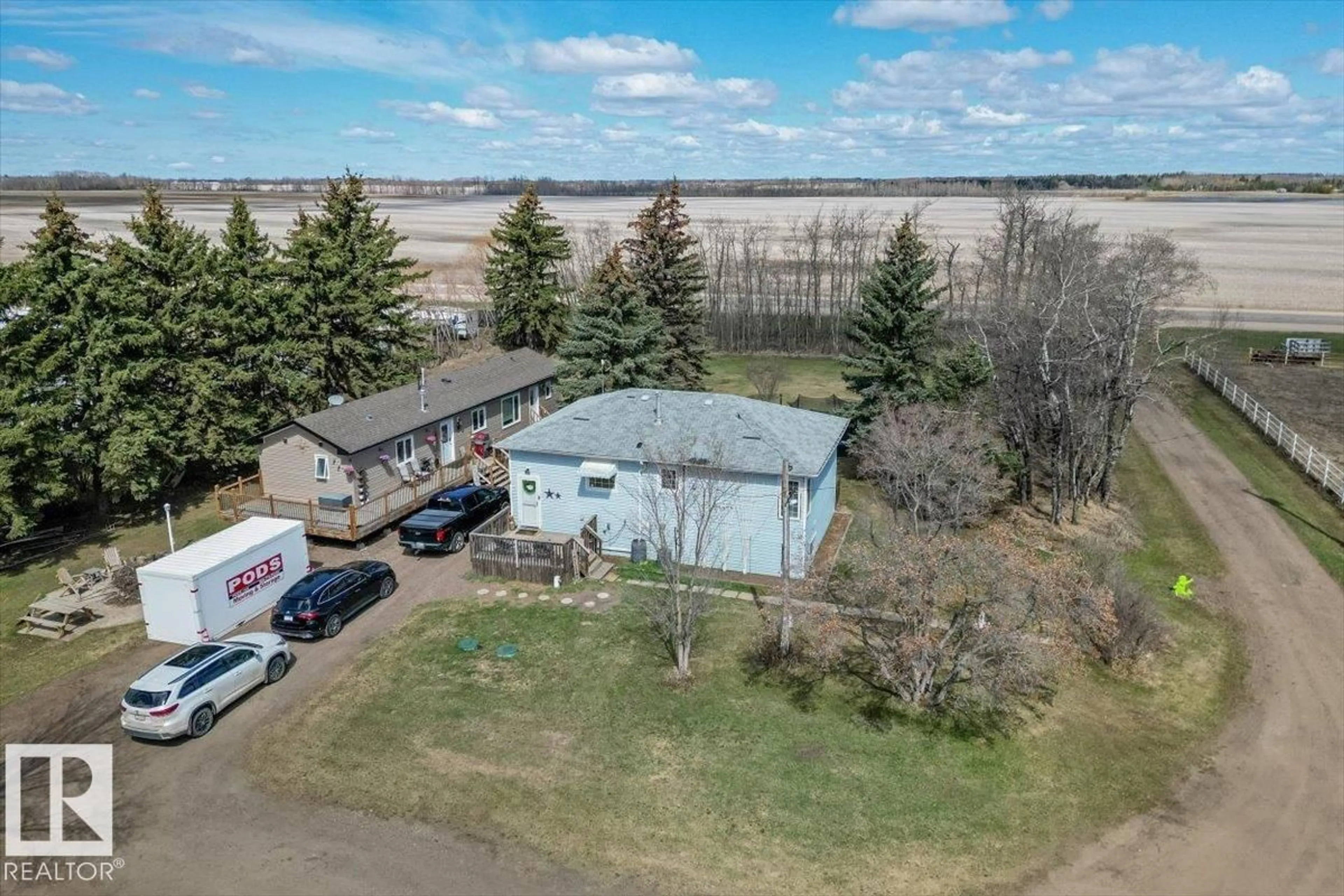 A pic from outside/outdoor area/front of a property/back of a property/a pic from drone, unknown for 24507 SH 642, Rural Sturgeon County Alberta T8R1P4