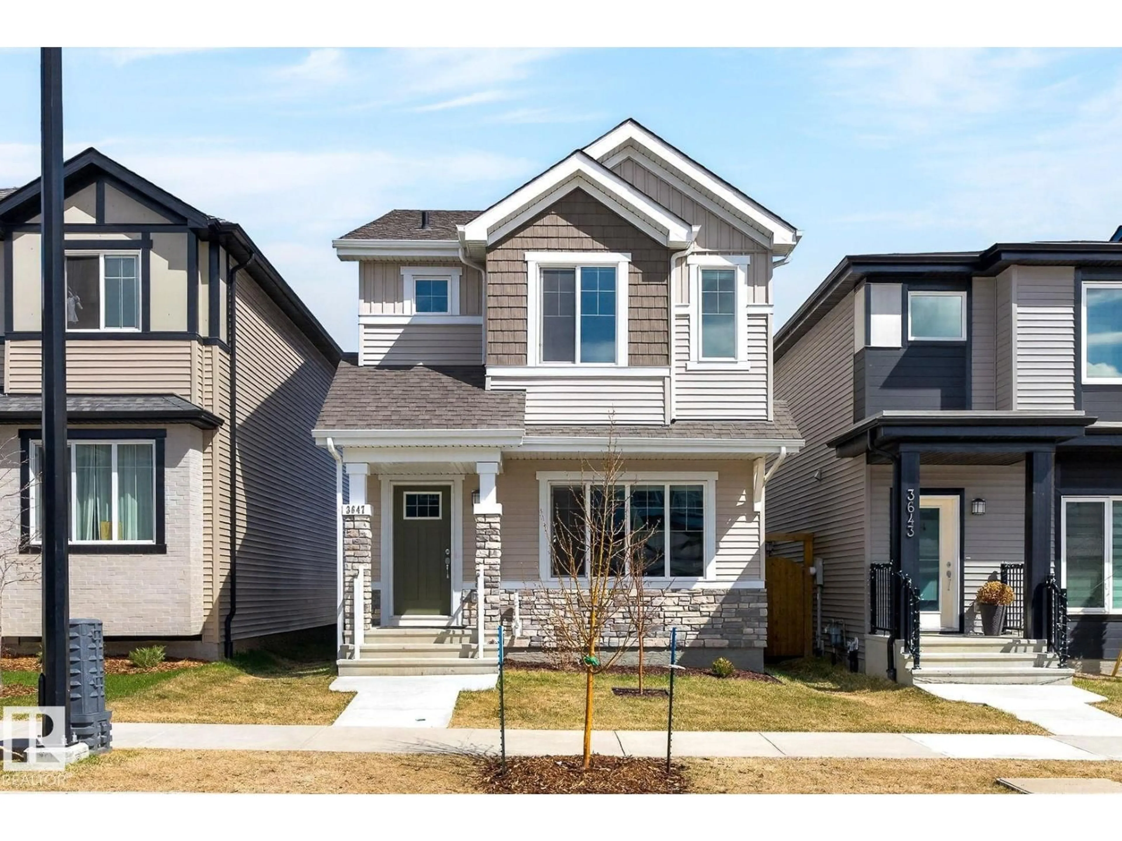 Home with vinyl exterior material, street for NW - 3647 214 ST, Edmonton Alberta T6M1S3