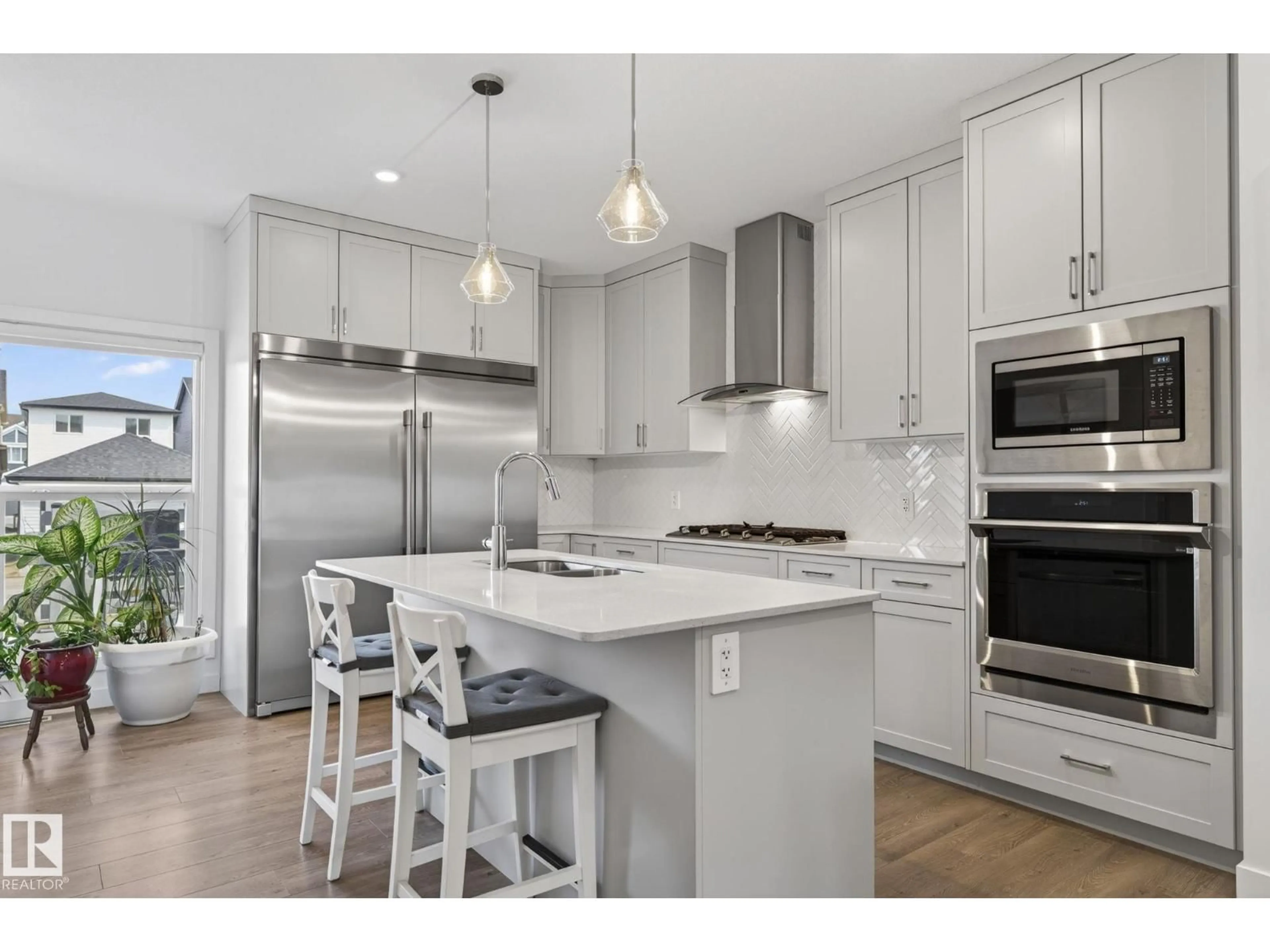 Open concept kitchen, unknown for NW - 3647 214 ST, Edmonton Alberta T6M1S3