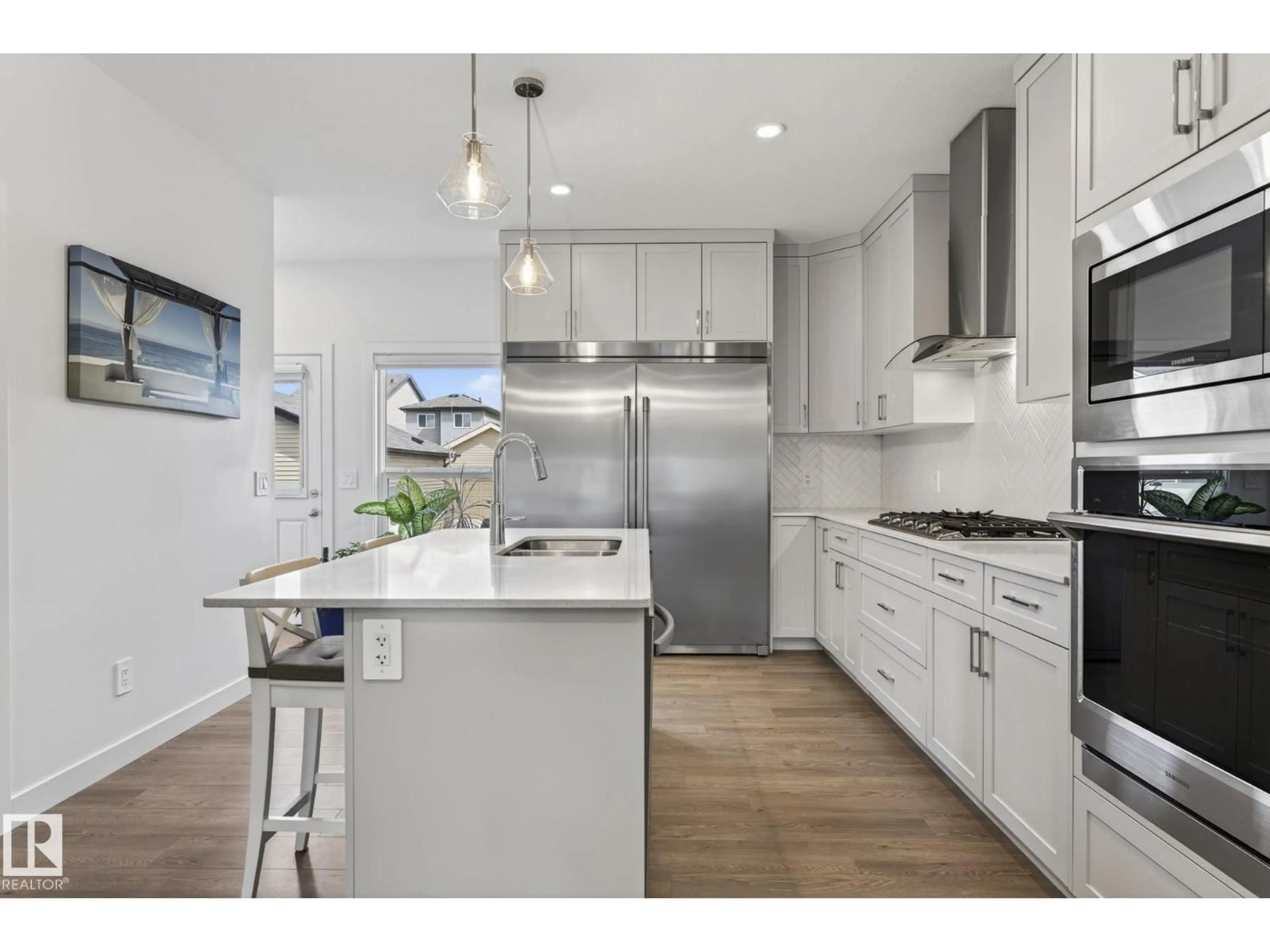 Open concept kitchen, unknown for NW - 3647 214 ST, Edmonton Alberta T6M1S3
