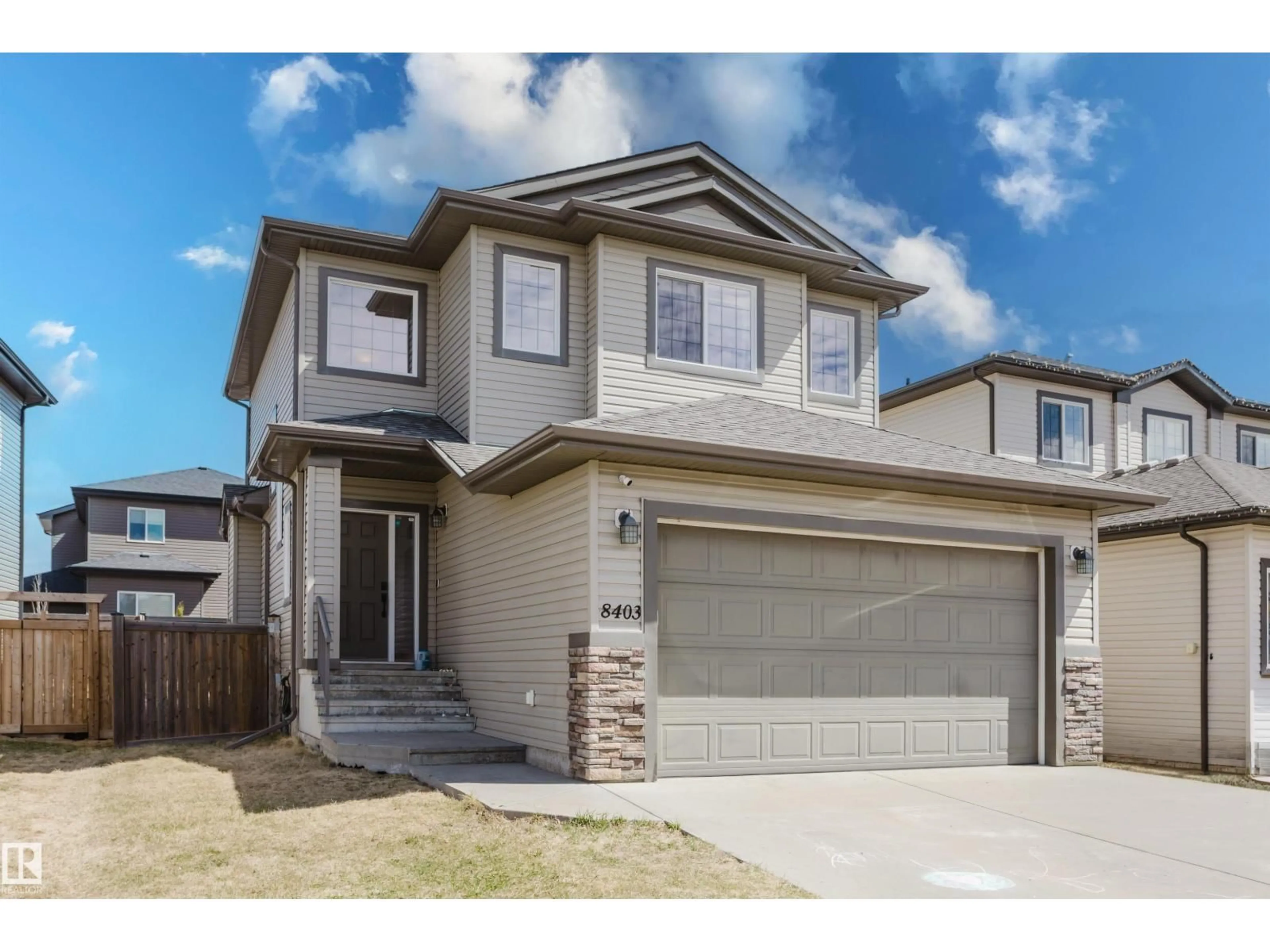 Home with vinyl exterior material, street for 8403 95 ST, Morinville Alberta T8R0A7