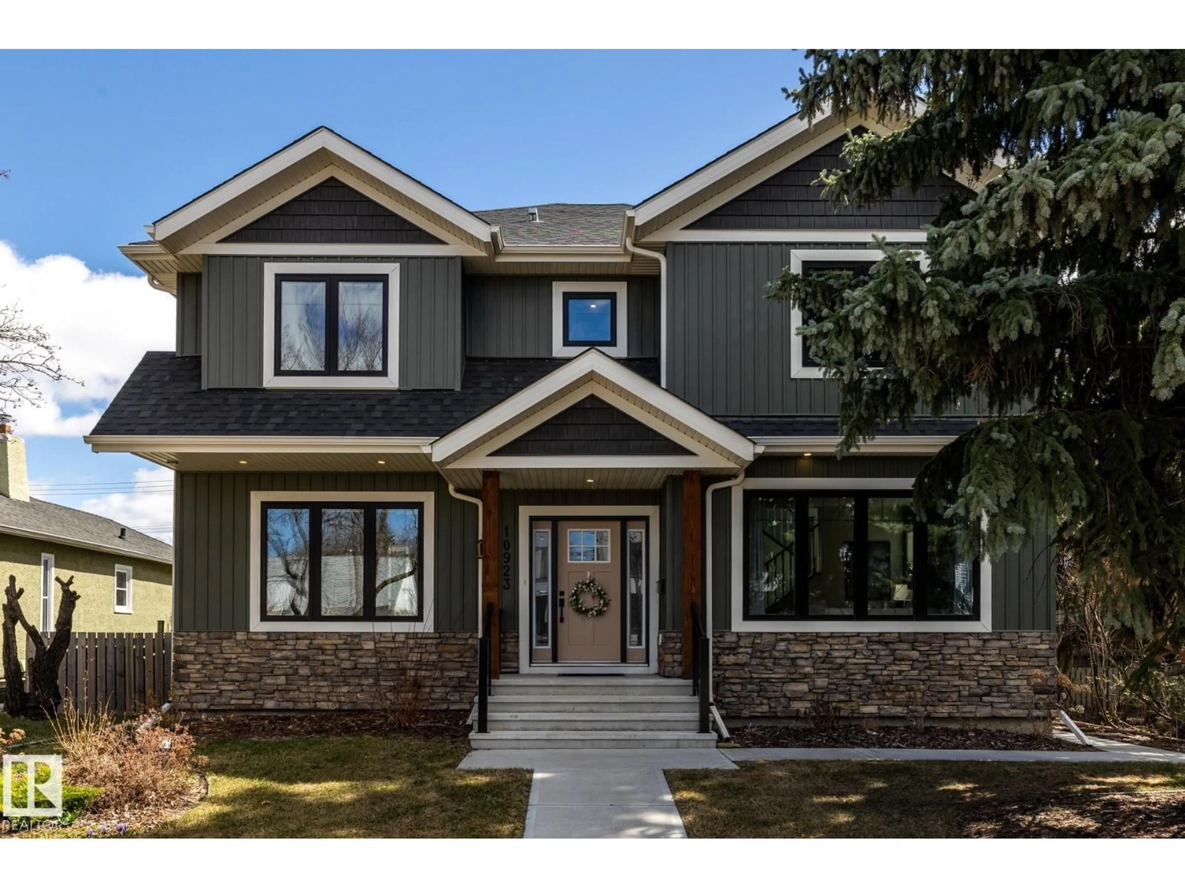 Home with brick exterior material, street for 10923 130 ST NW, Edmonton Alberta T5M0Z4
