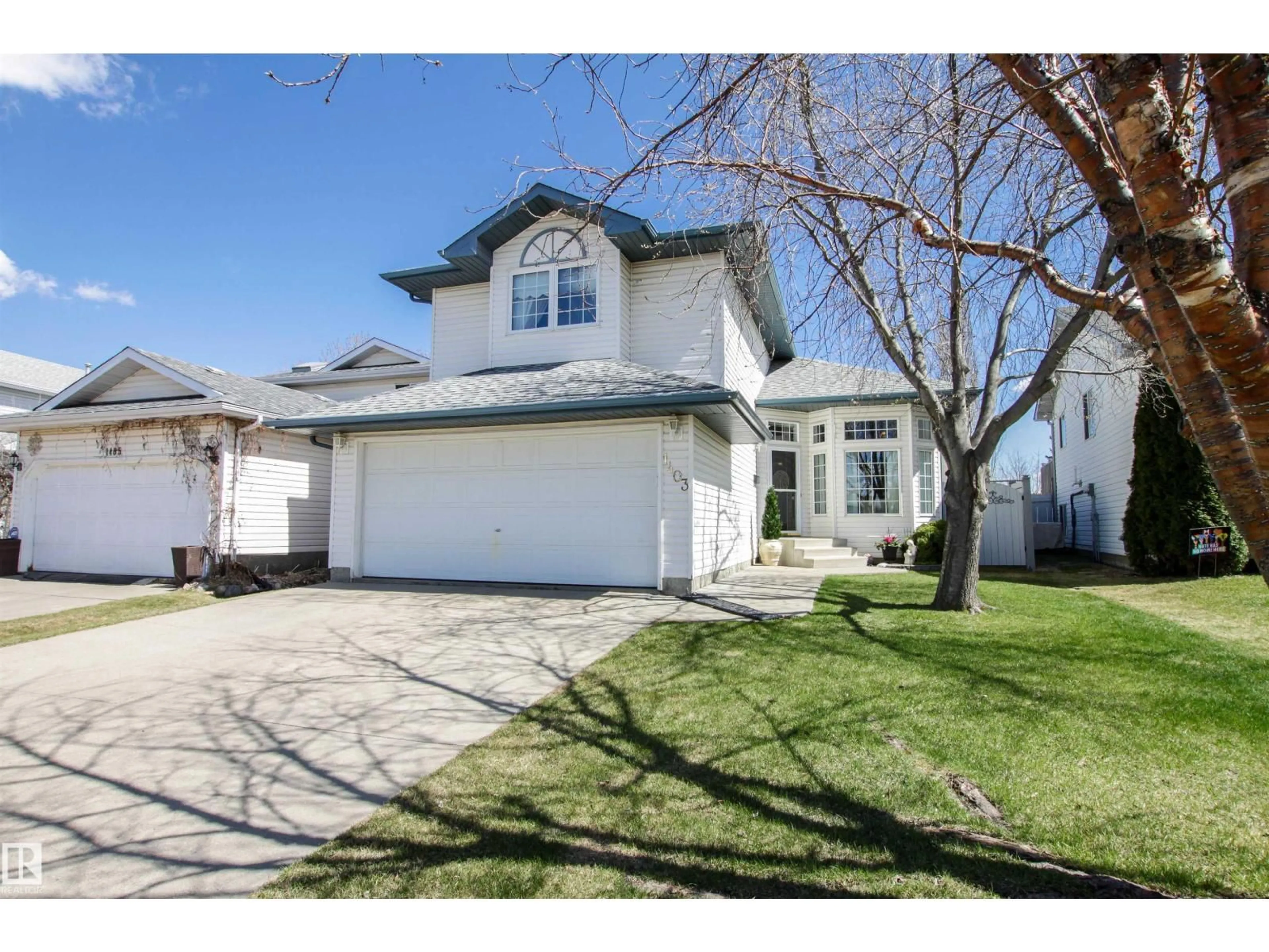 Home with vinyl exterior material, street for 1403 JEFFERYS CR, Edmonton Alberta T6L6T4