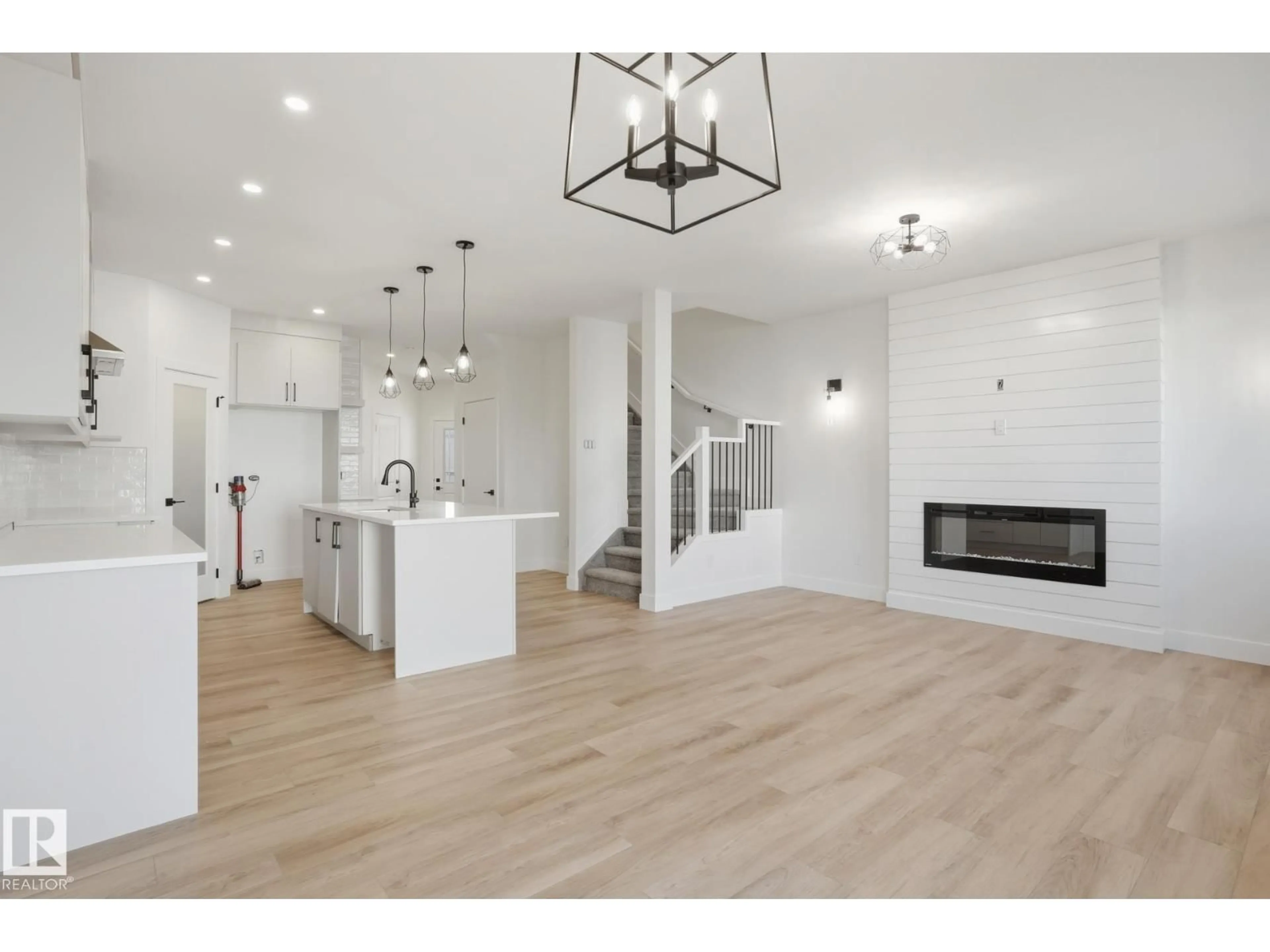 Open concept kitchen, wood/laminate floor for 96 SPRING LI, Spruce Grove Alberta T7X2X7