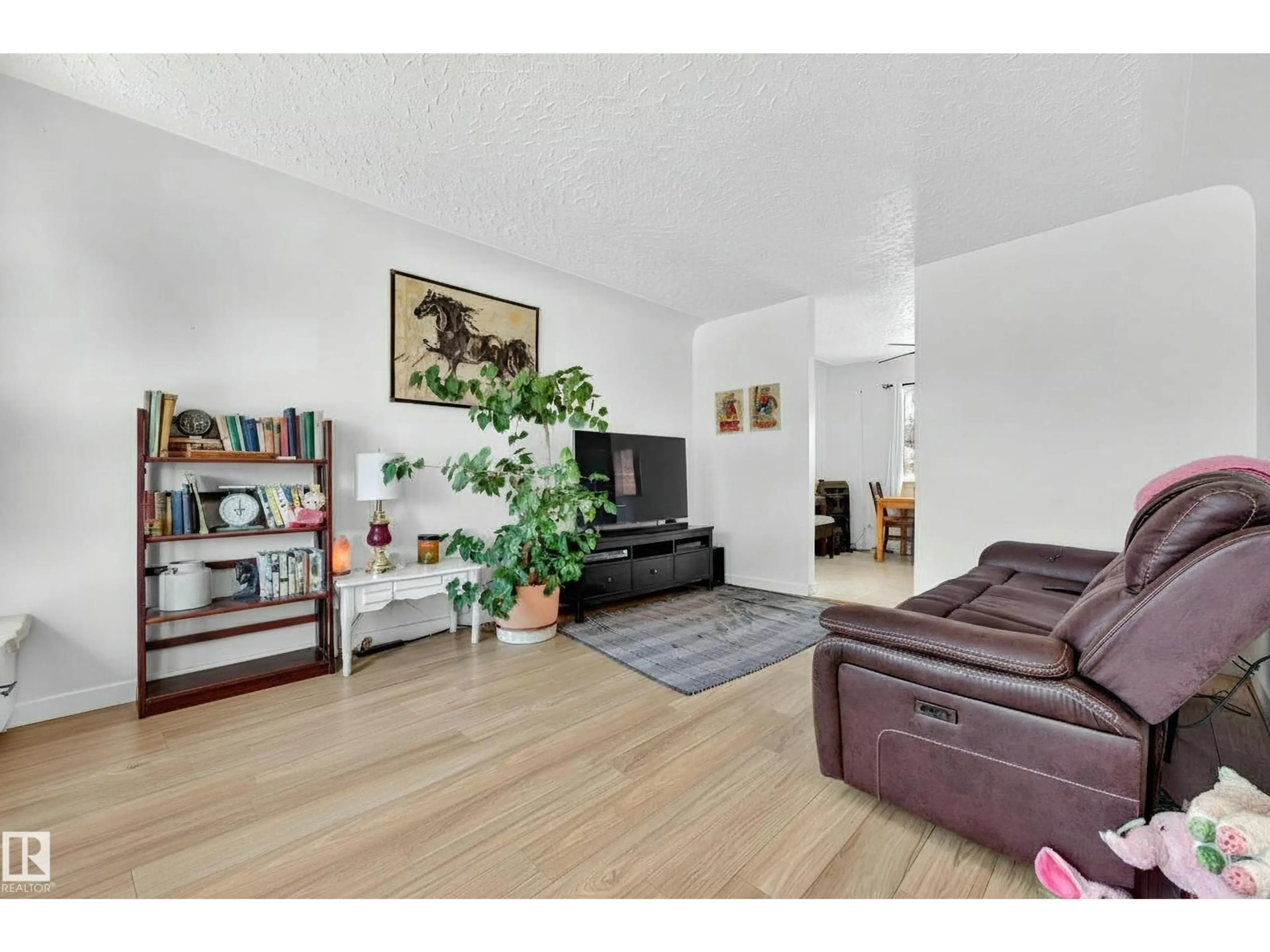 Living room with furniture, unknown for 13620 119 AV, Edmonton Alberta T5L2N6