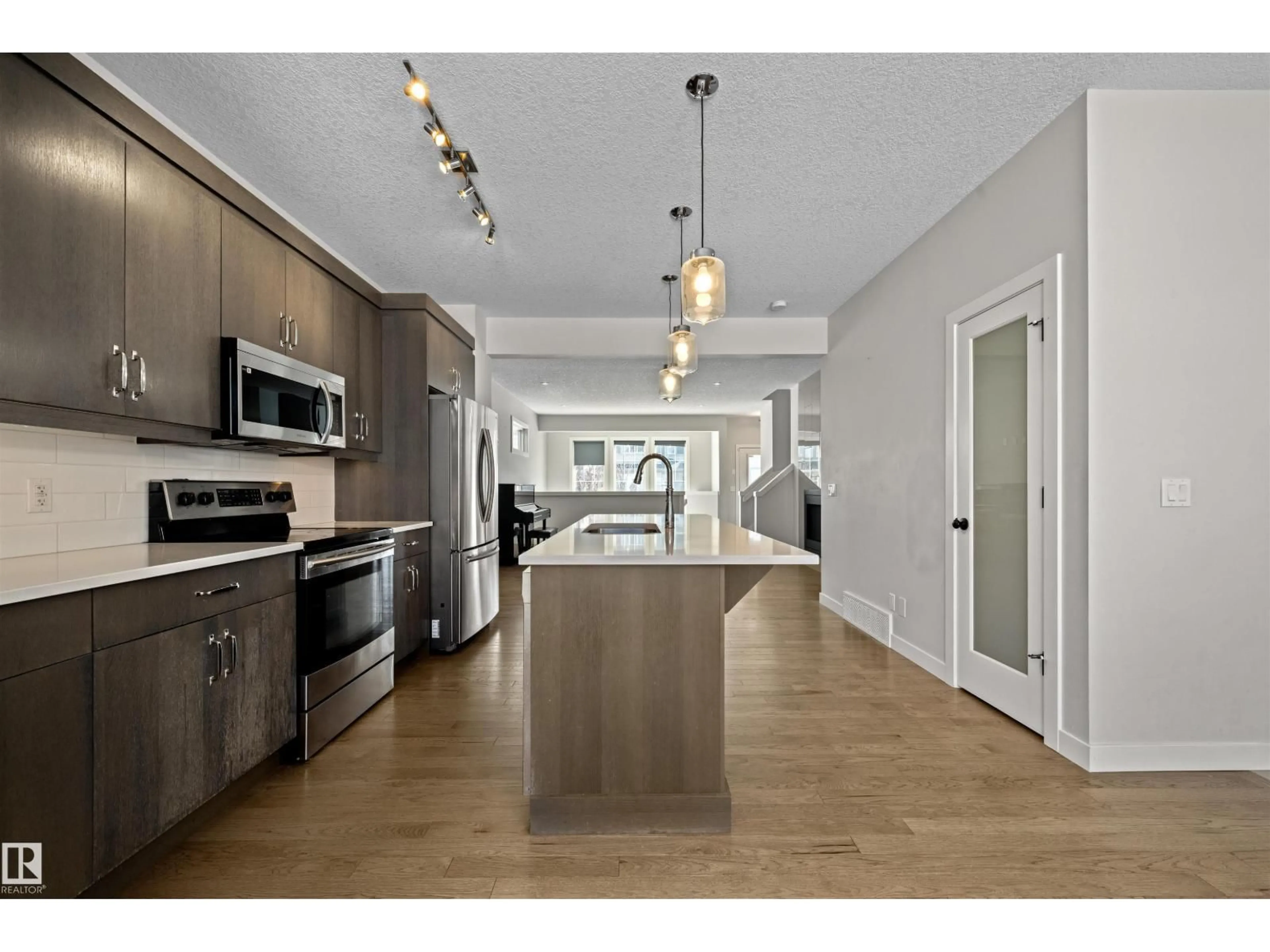 Open concept kitchen, unknown for SW - 6906 CARDINAL WD, Edmonton Alberta T6W2Y4