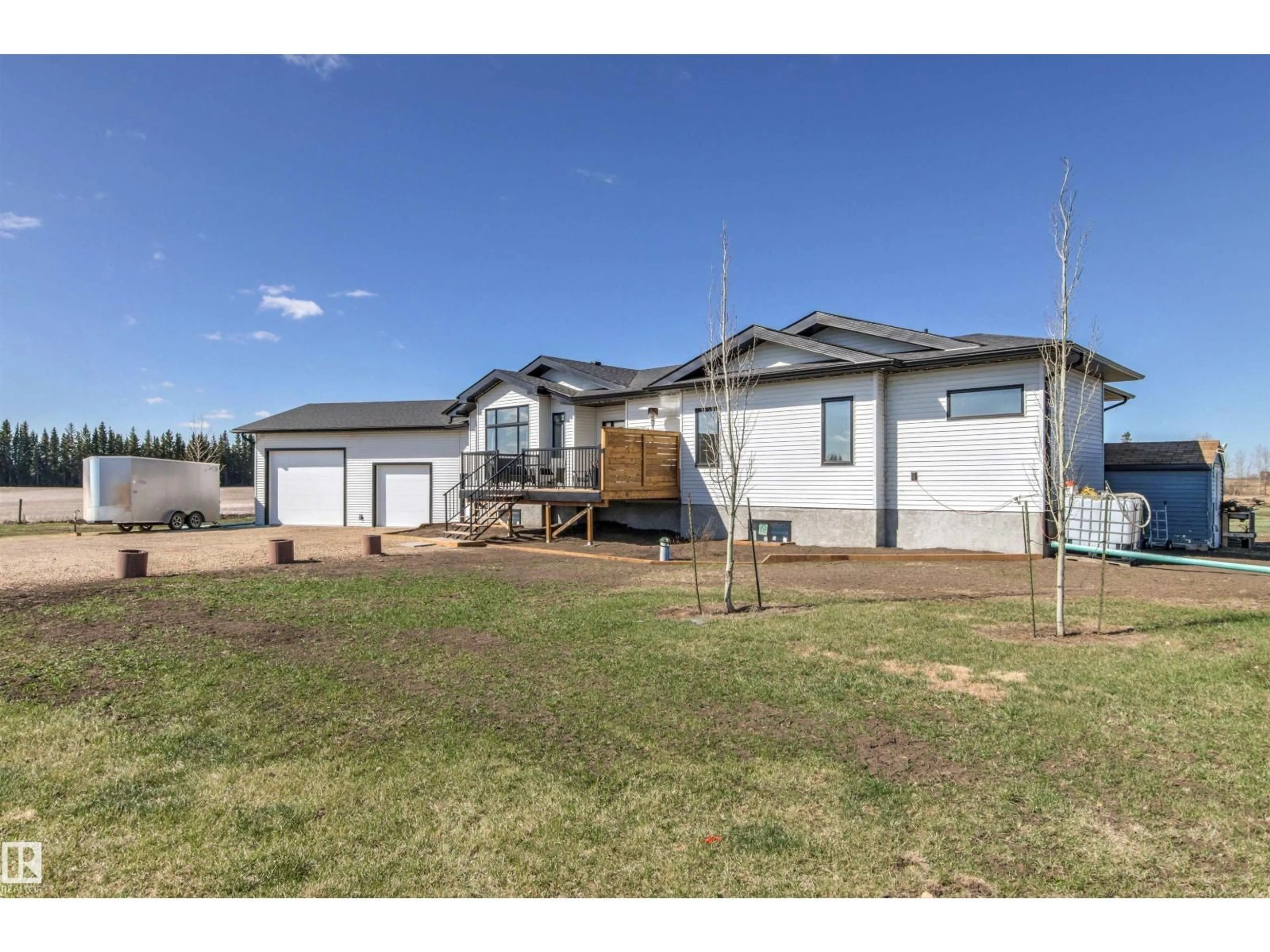 A pic from outside/outdoor area/front of a property/back of a property/a pic from drone, unknown for 50062 RGE RD 255, Rural Leduc County Alberta T9G0C6