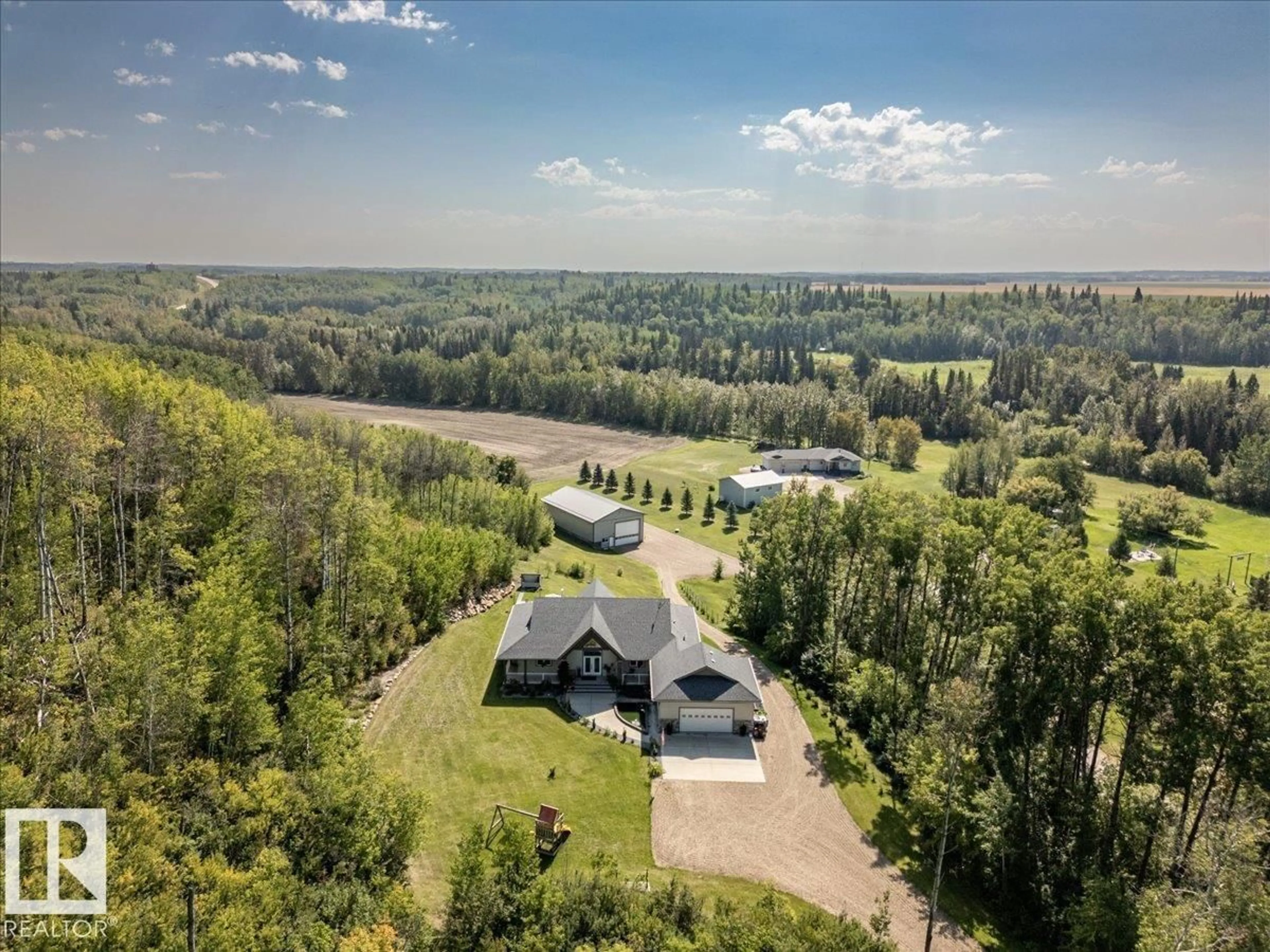 A pic from outside/outdoor area/front of a property/back of a property/a pic from drone, unknown for 622 - 160 2032 HWY, Rural Leduc County Alberta T0C2P0
