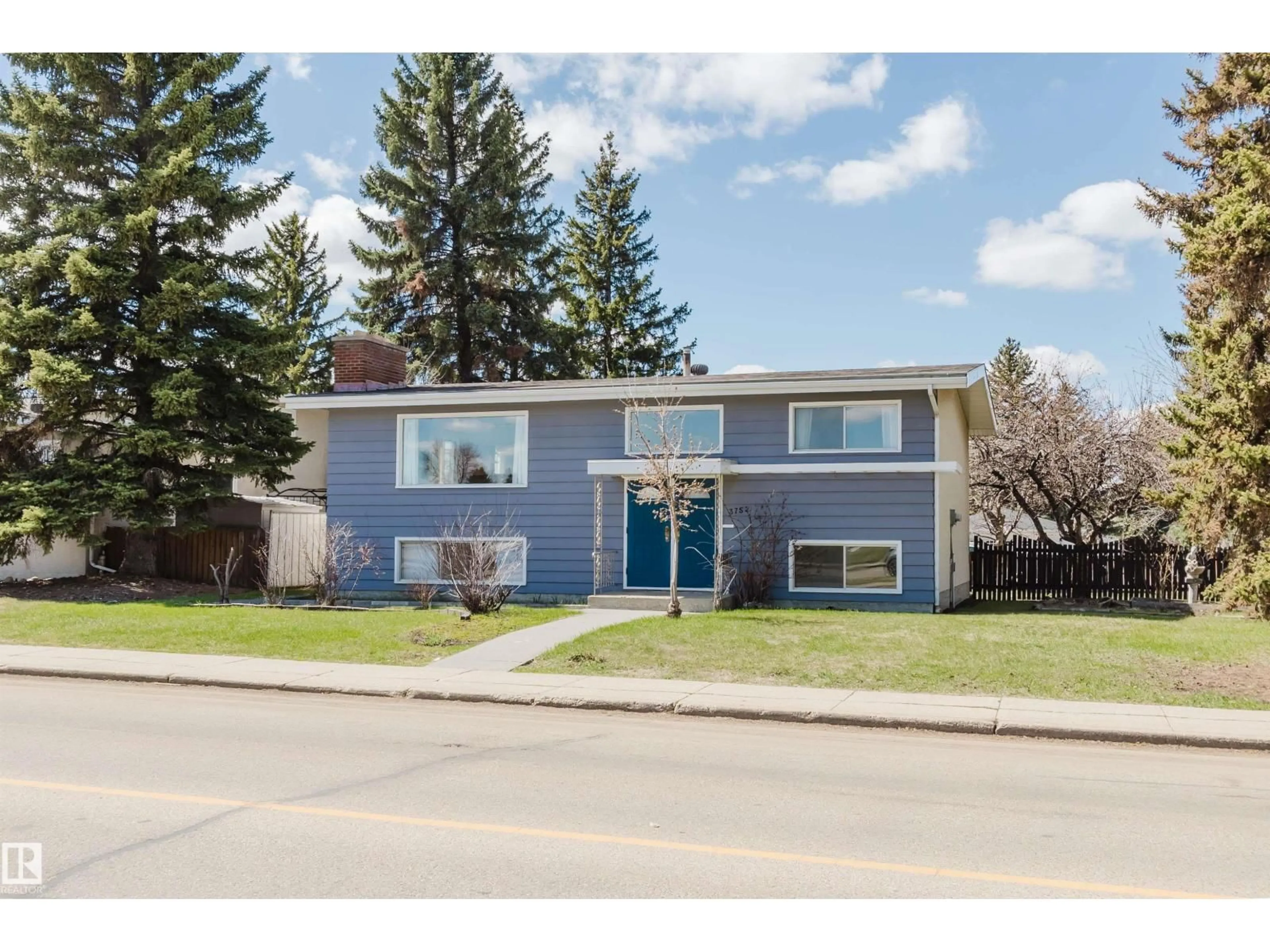 Home with vinyl exterior material, street for 3752 114 ST, Edmonton Alberta T6J1M4