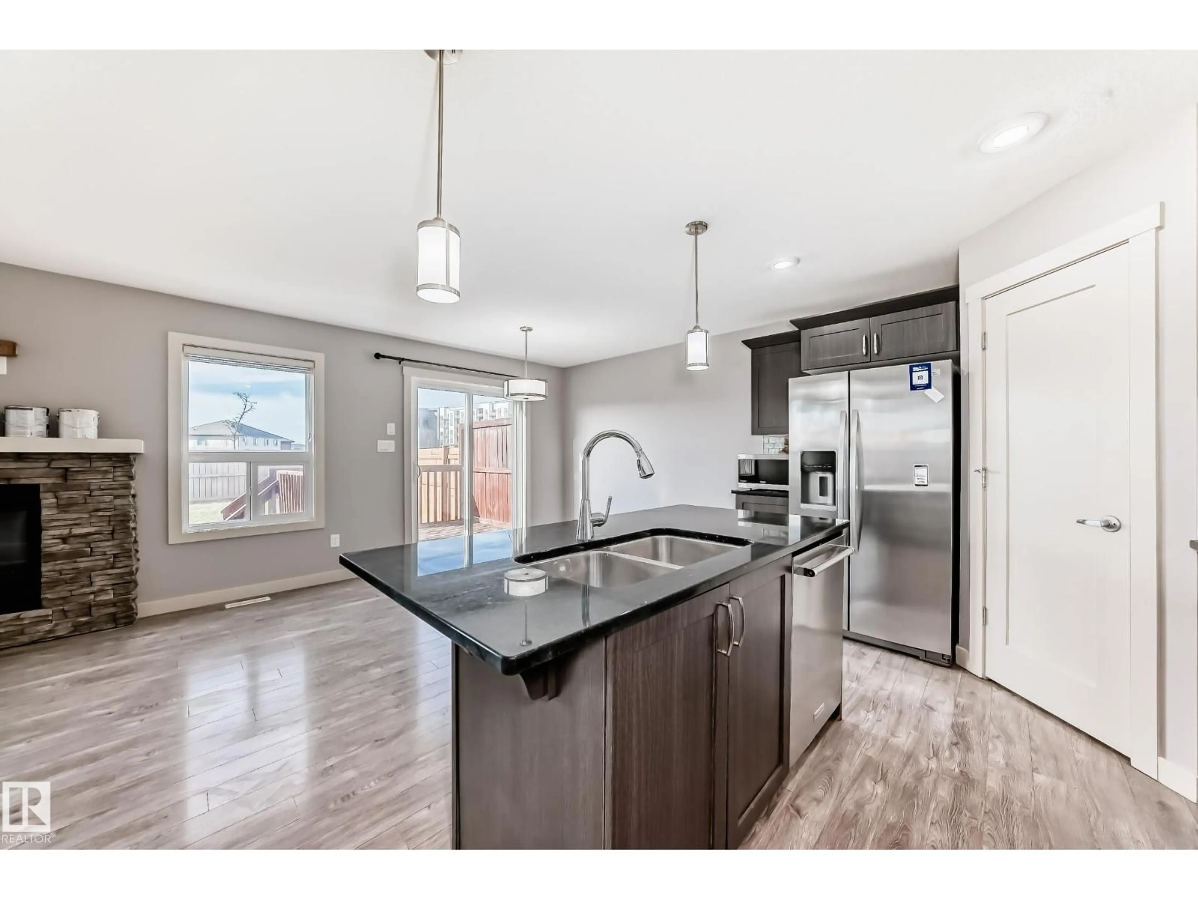 Open concept kitchen, unknown for NW - 1669 HAMMOND CR, Edmonton Alberta T6M0N3