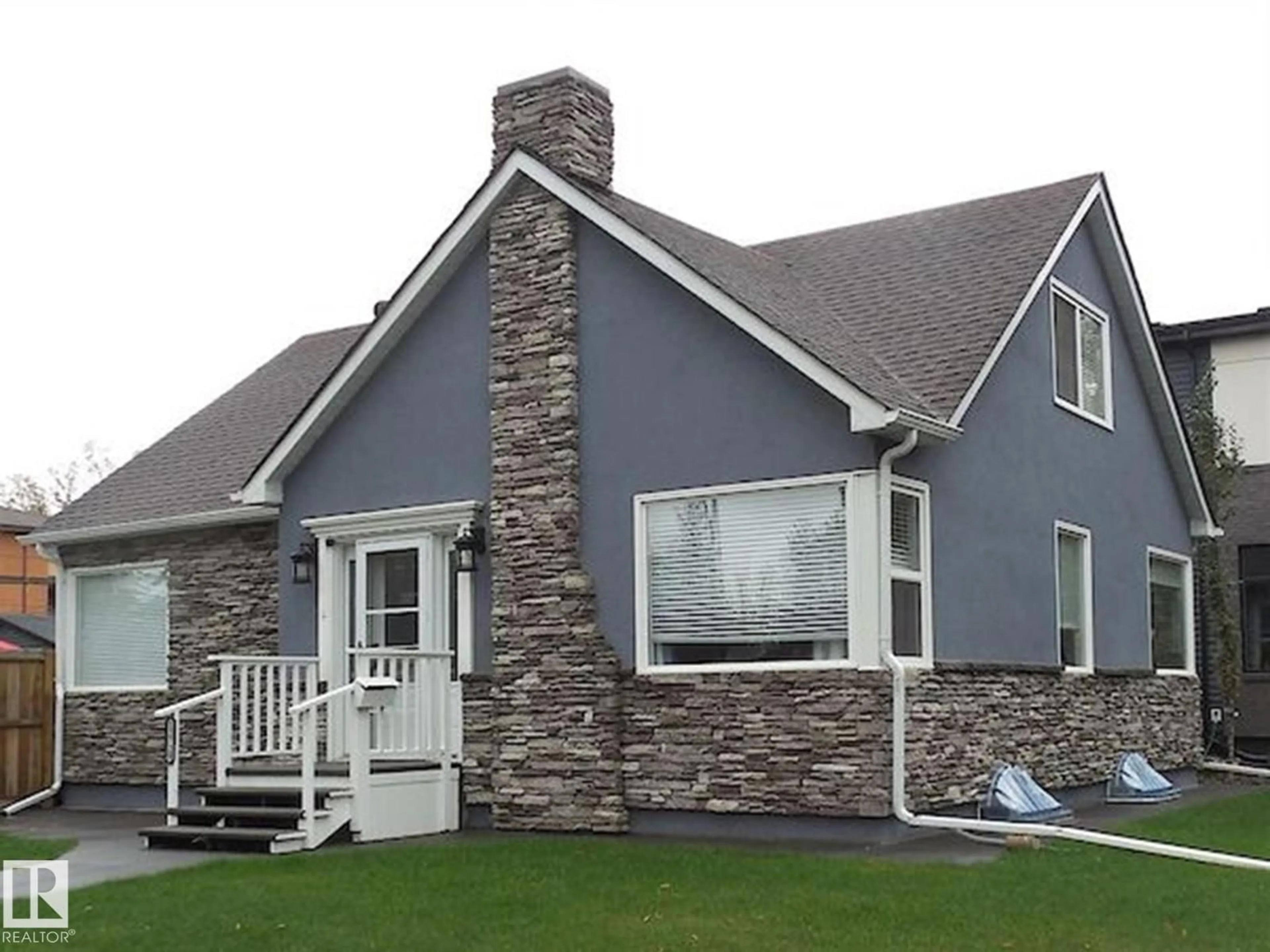 Home with vinyl exterior material, unknown for 12729 108 AV, Edmonton Alberta T5M2B8