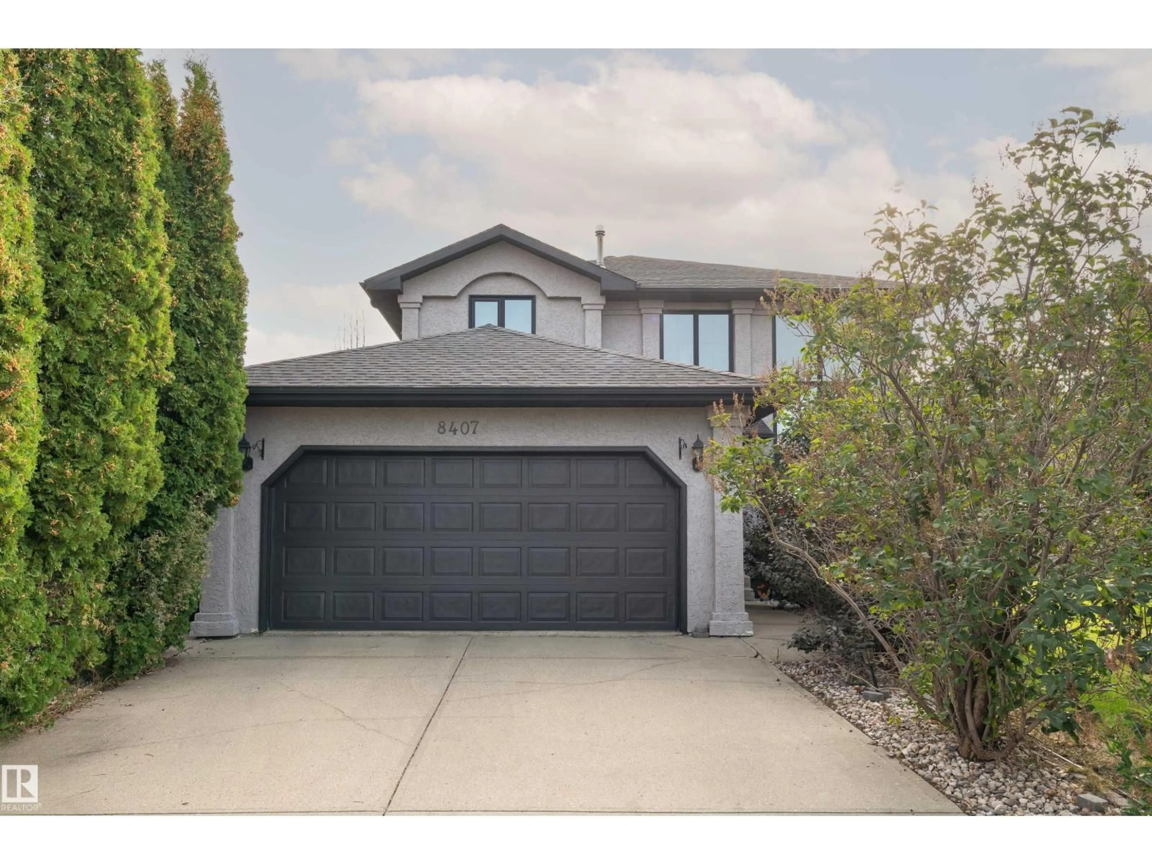 Home with vinyl exterior material, street for 8407 160 AV, Edmonton Alberta T5Z3E6