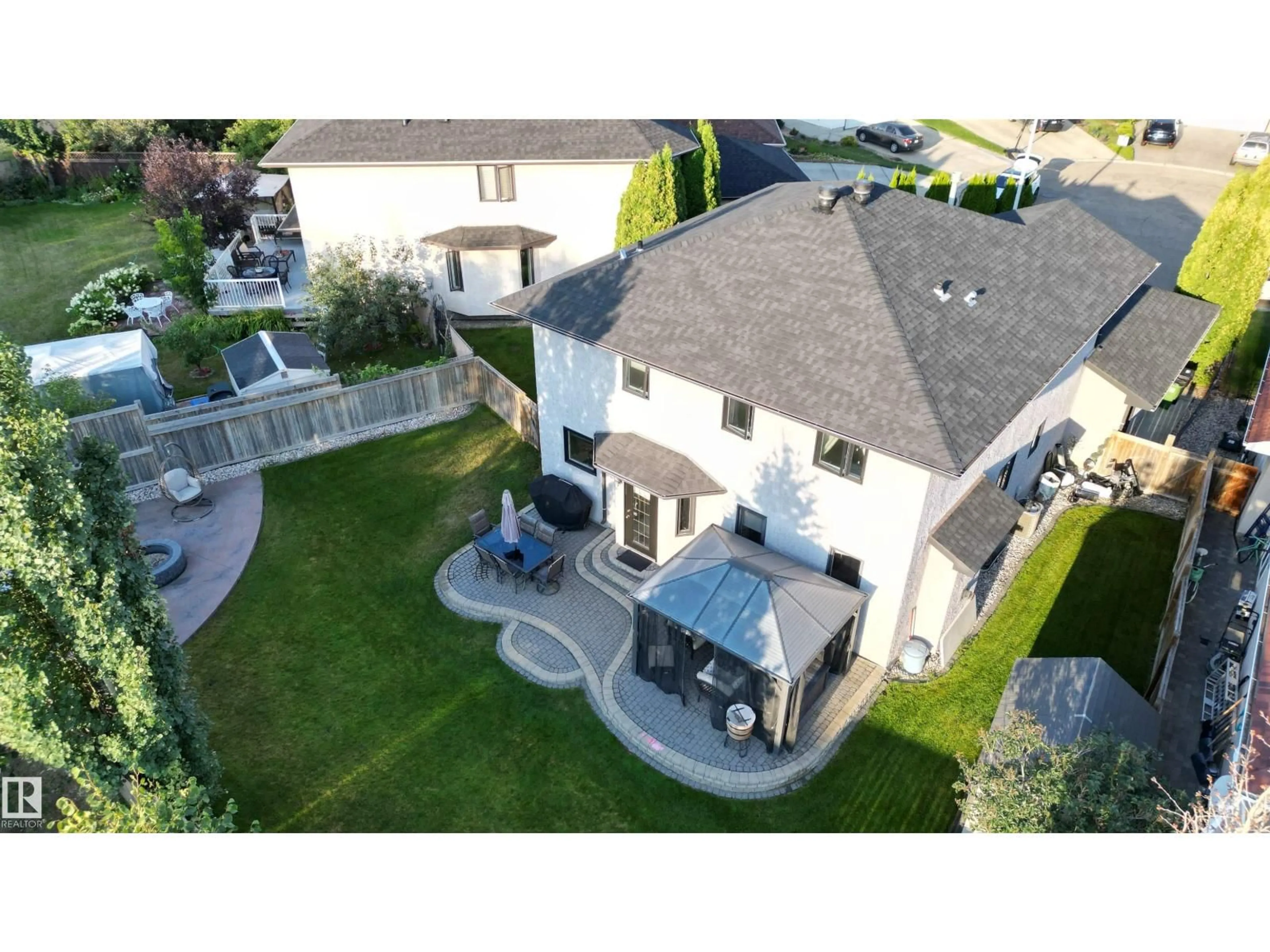 A pic from outside/outdoor area/front of a property/back of a property/a pic from drone, street for 8407 160 AV, Edmonton Alberta T5Z3E6