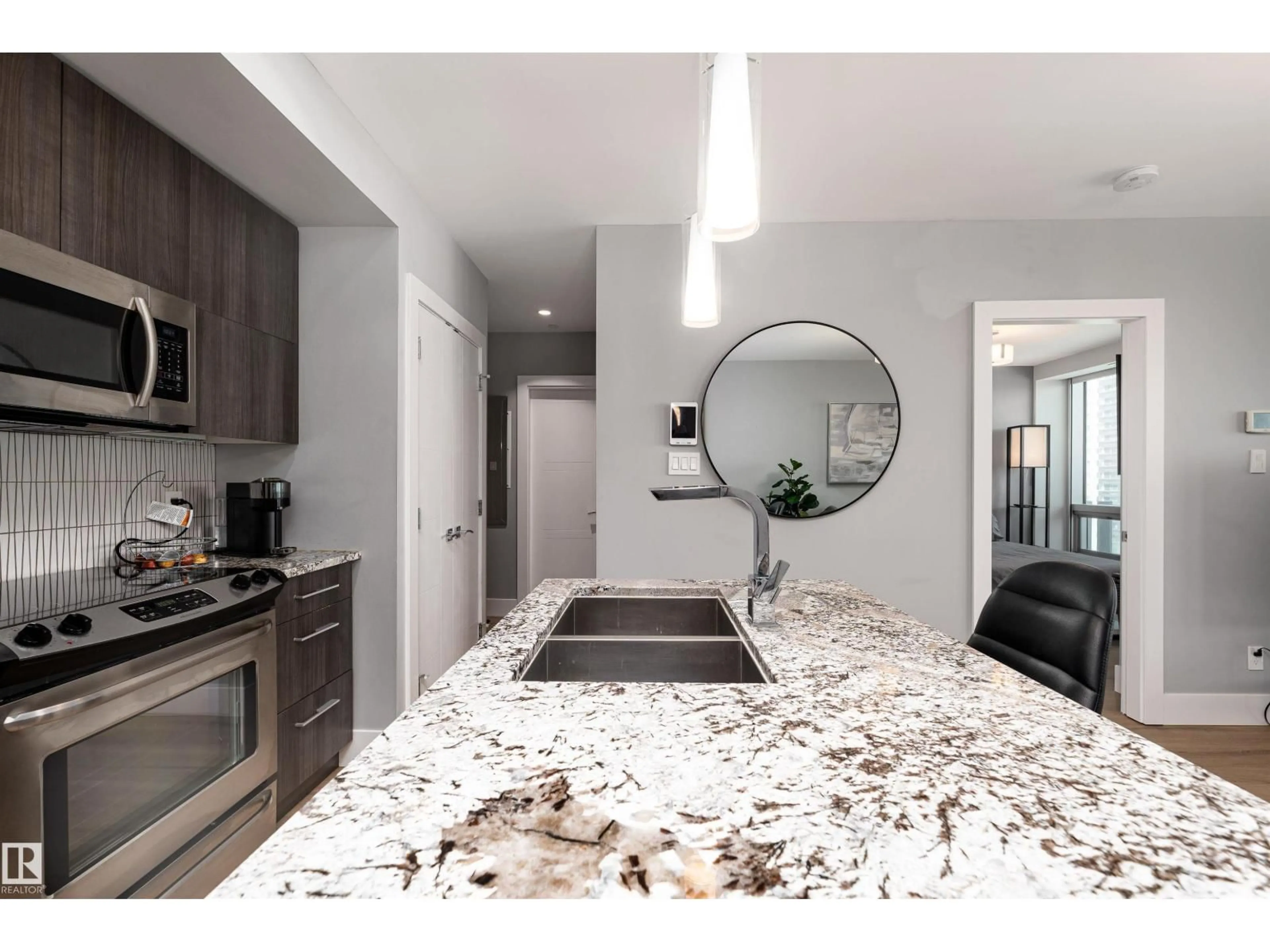 Open concept kitchen, ceramic/tile floor for 1404 - 11969 JASPER AV, Edmonton Alberta T5K0P1