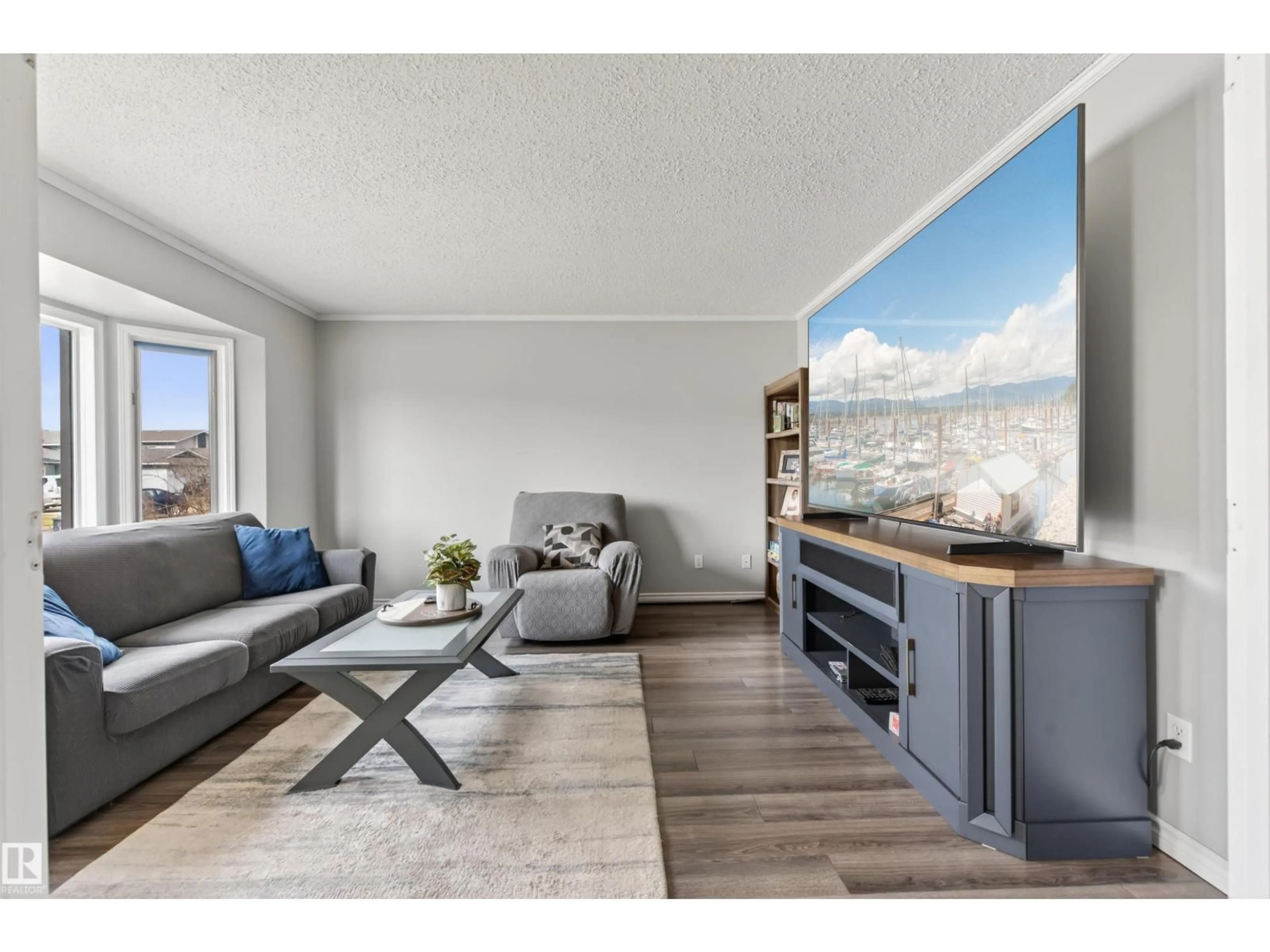 Living room with furniture, wood/laminate floor for 6009 53 AV, Cold Lake Alberta T9M1T4
