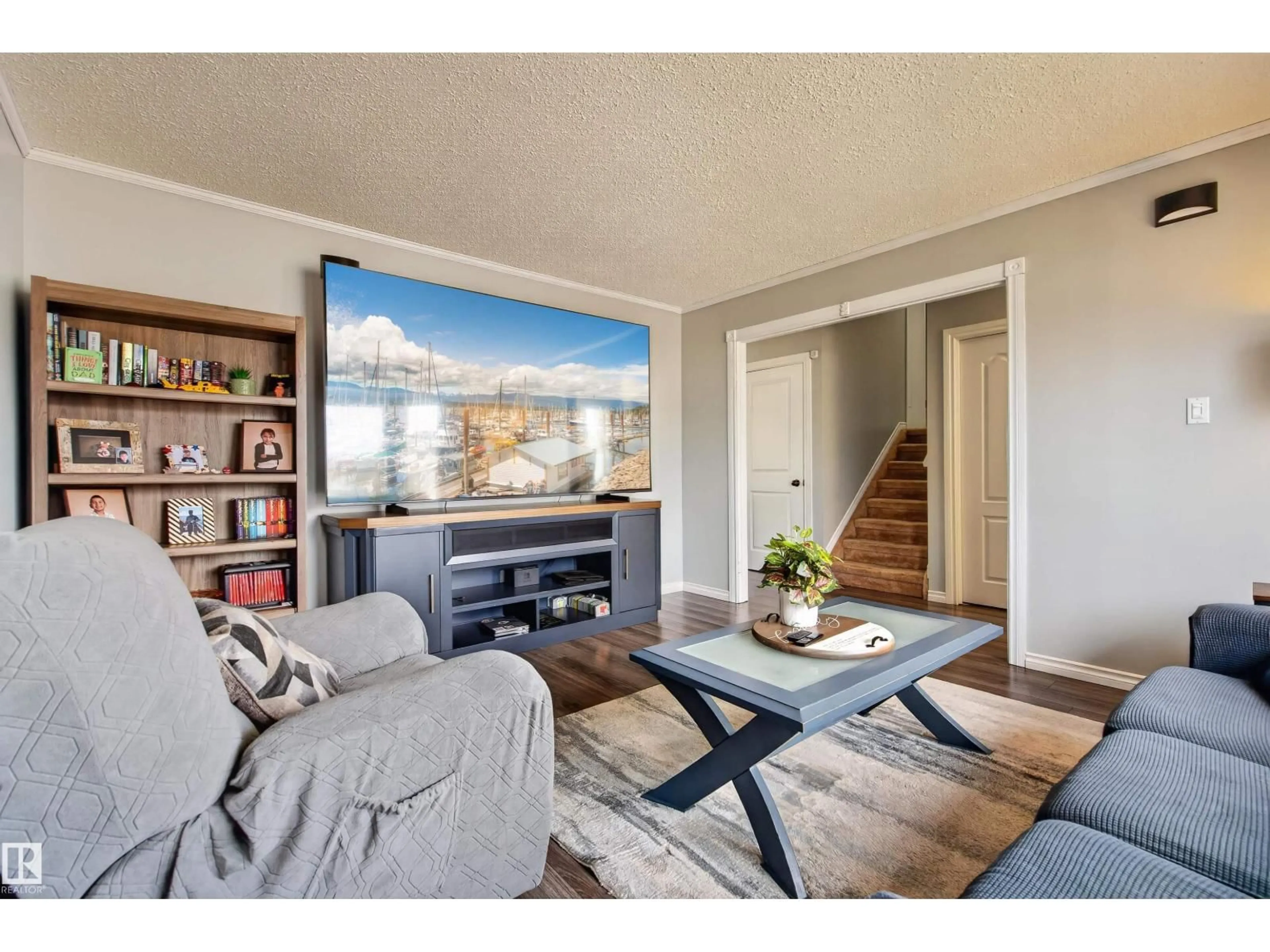 Living room with furniture, wood/laminate floor for 6009 53 AV, Cold Lake Alberta T9M1T4