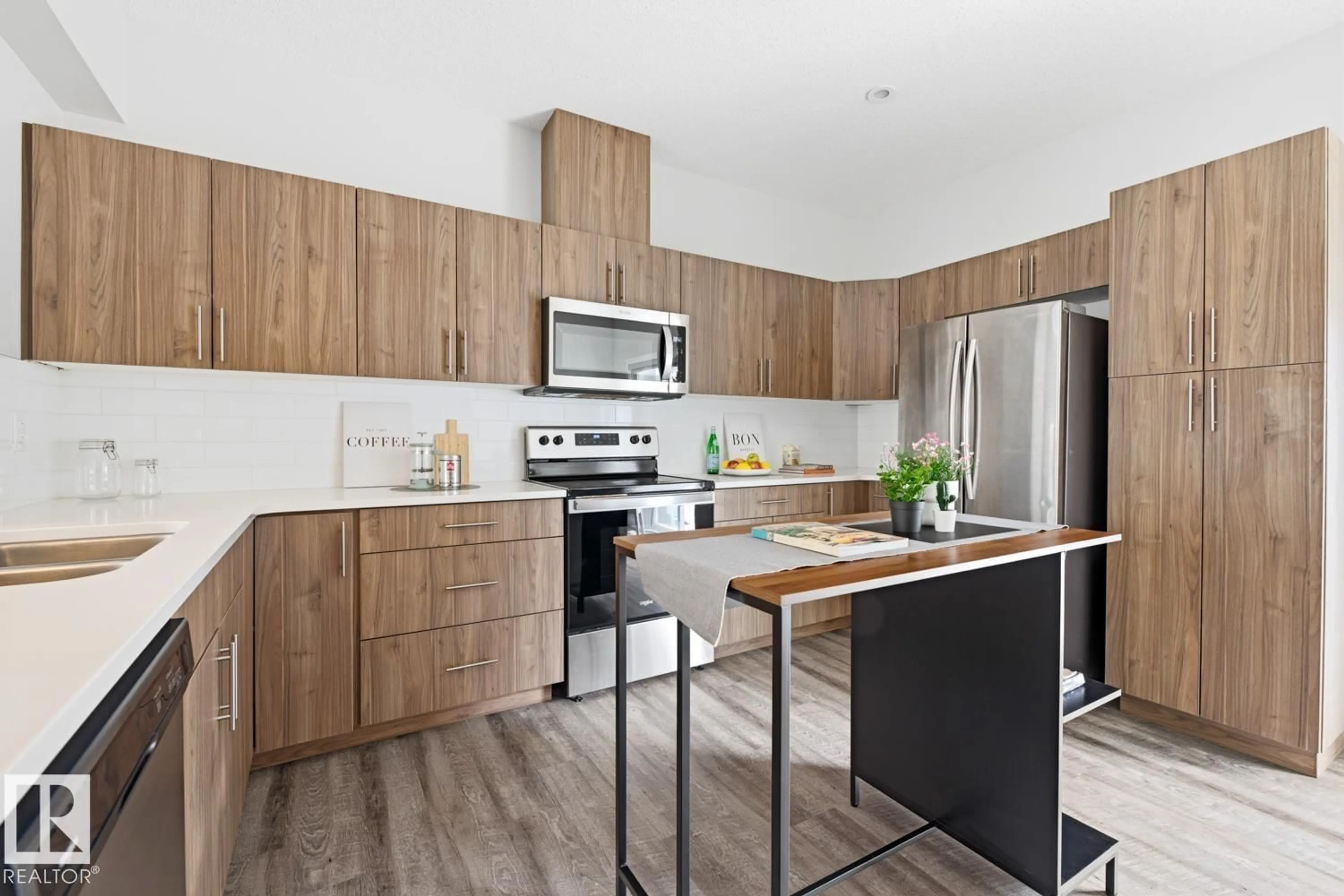Open concept kitchen, wood/laminate floor for 1051 - 40 GRAYDON HILL BV, Edmonton Alberta T6W3C8