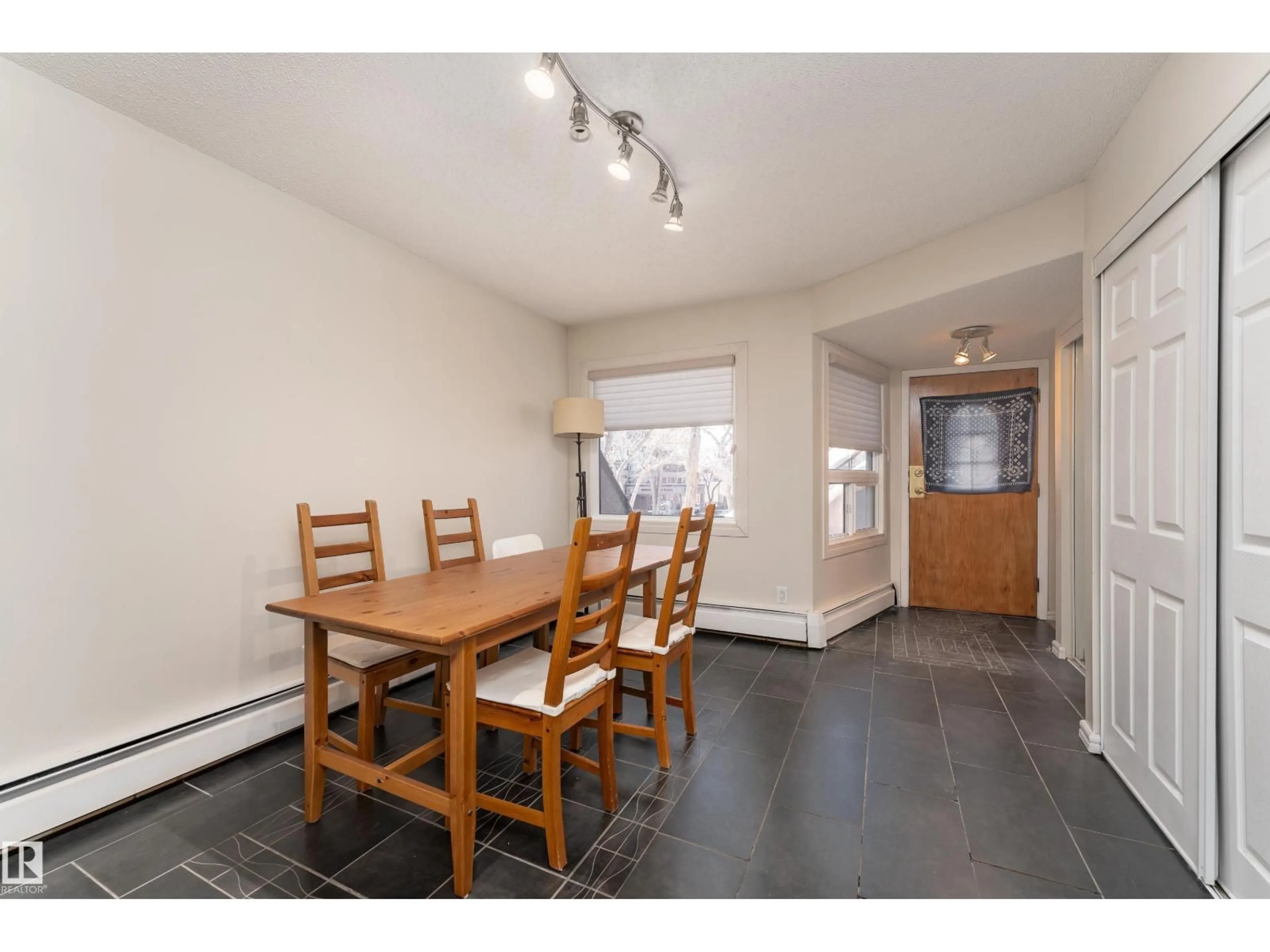 Dining room, wood/laminate floor for 11120 83 AV, Edmonton Alberta T6G0V1