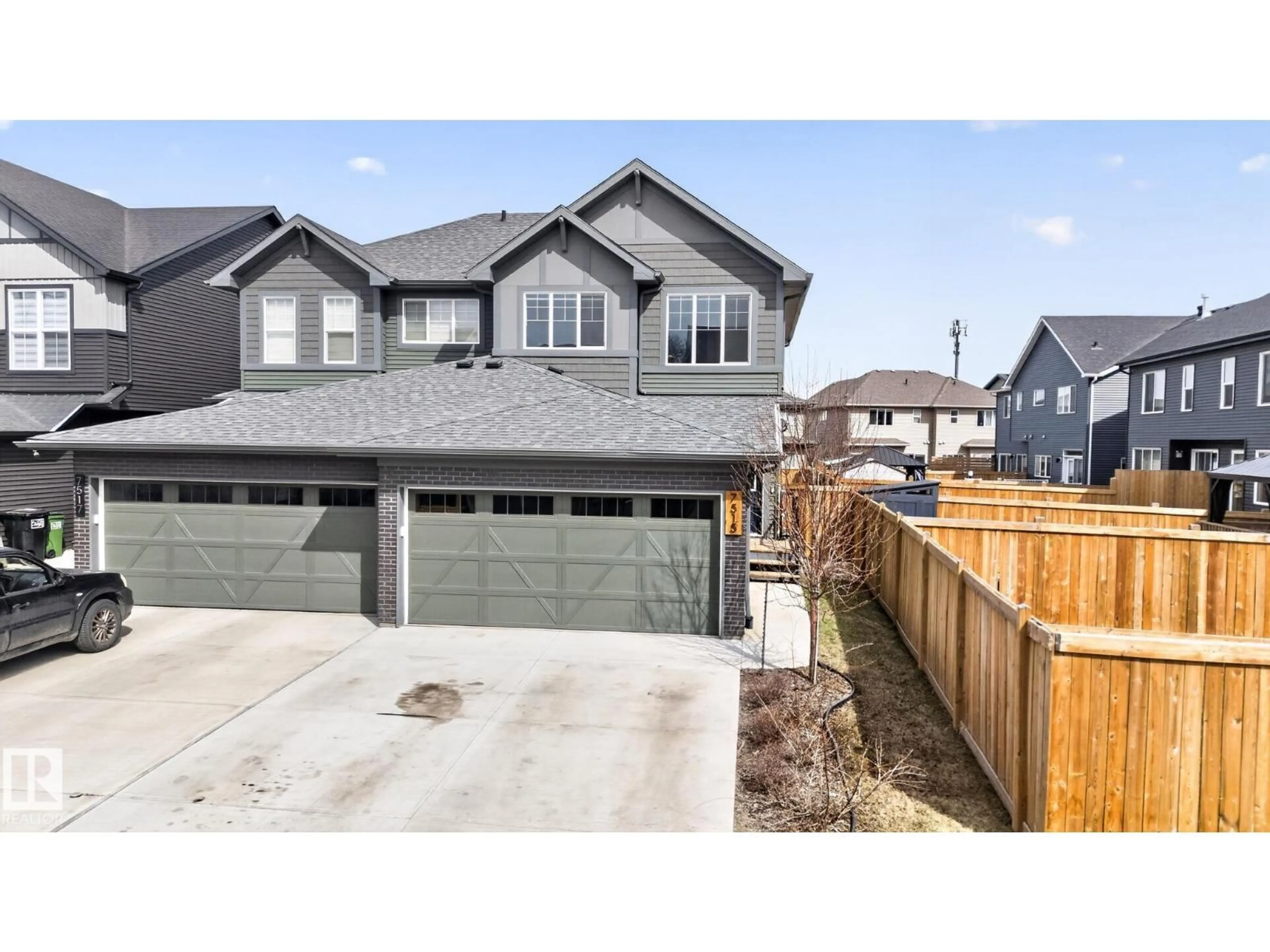 Home with vinyl exterior material, street for 7515 ELMER BEND NW, Edmonton Alberta T6M1K2