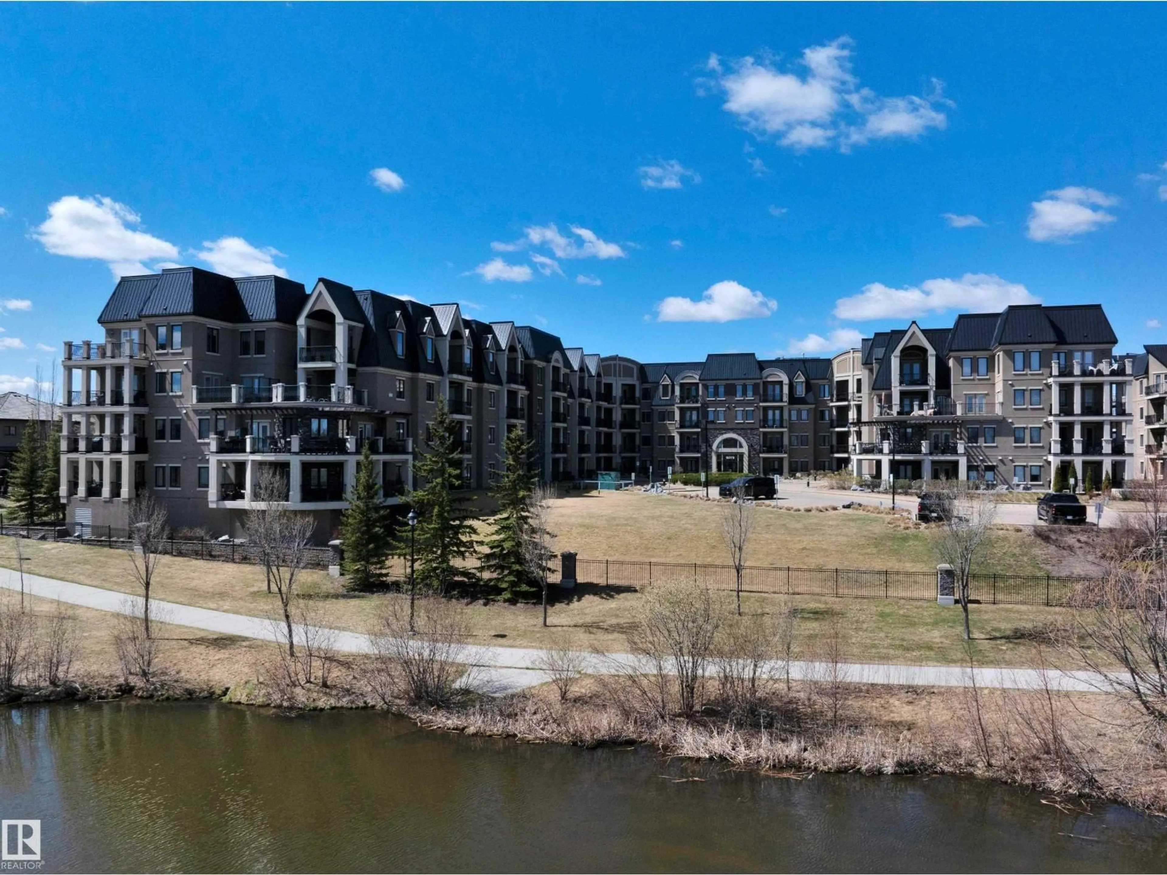 A pic from outside/outdoor area/front of a property/back of a property/a pic from drone, water/lake/river/ocean view for 6079 - 243 MAYNARD WY, Edmonton Alberta T6R0S5