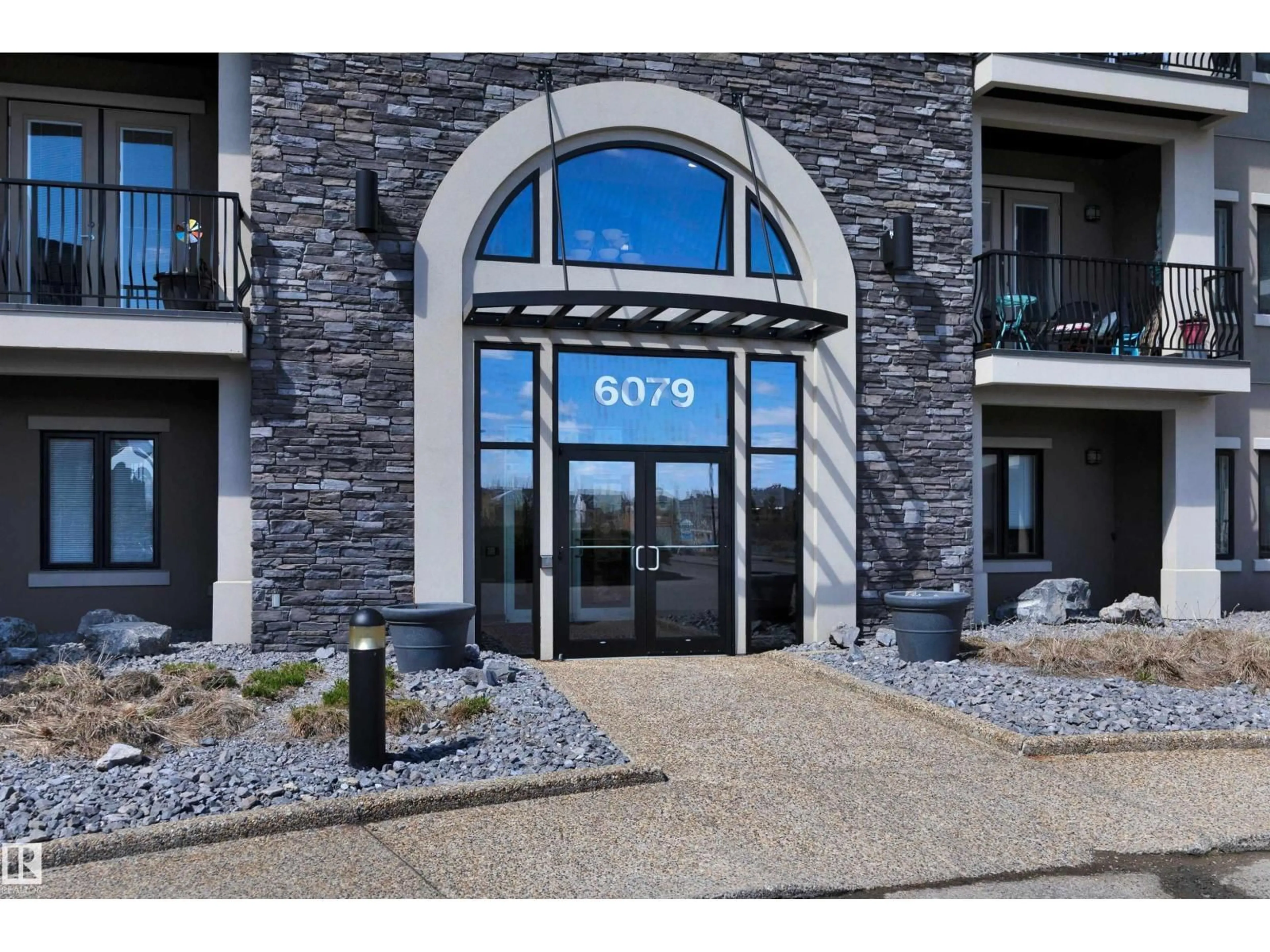Indoor foyer for 6079 - 243 MAYNARD WY, Edmonton Alberta T6R0S5