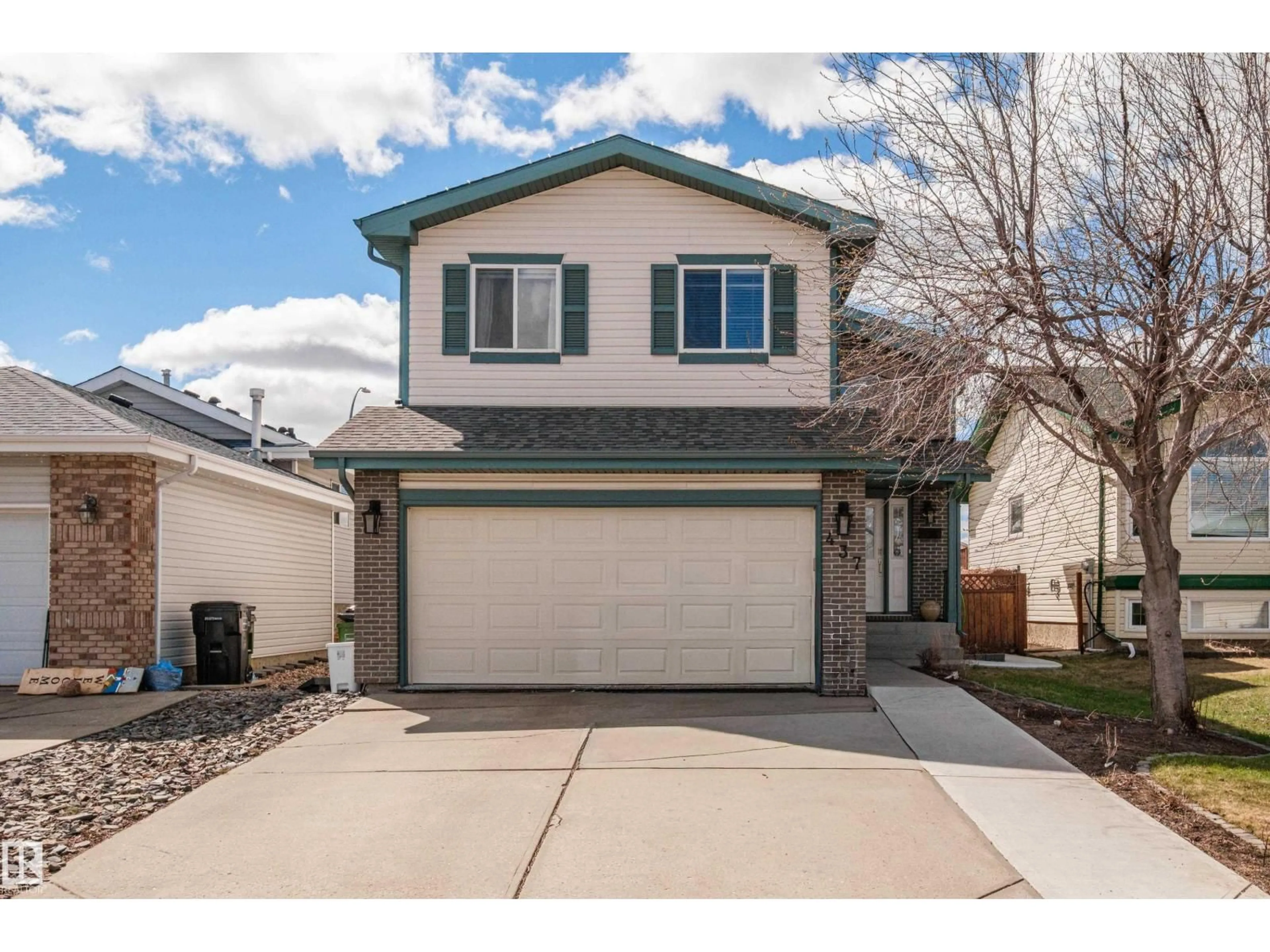 Home with vinyl exterior material, street for 437 KLARVATTEN LAKE WD, Edmonton Alberta T5Z3B9