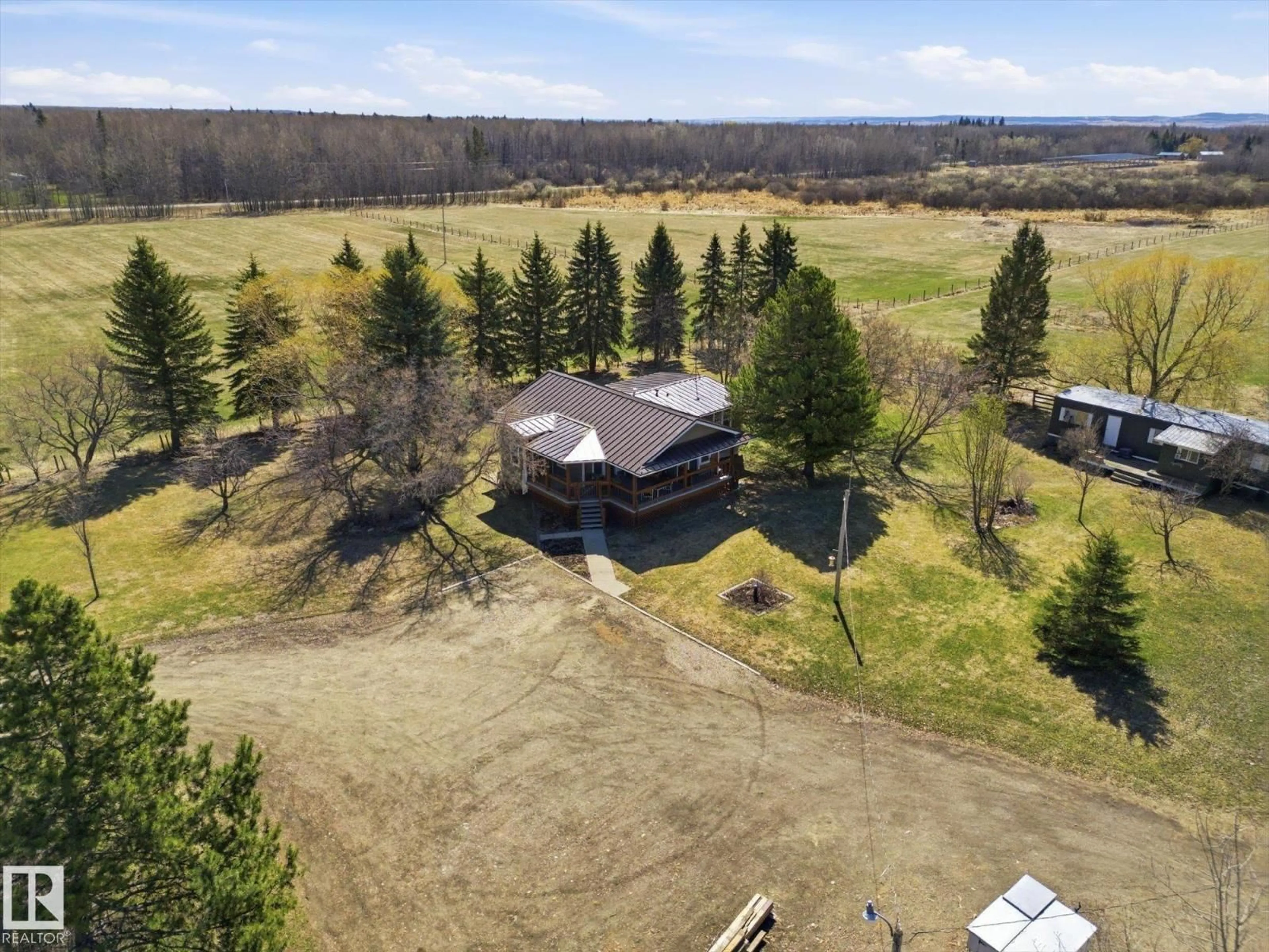 A pic from outside/outdoor area/front of a property/back of a property/a pic from drone, unknown for 5503 TWP ROAD 534, Rural Parkland County Alberta T0E0V0