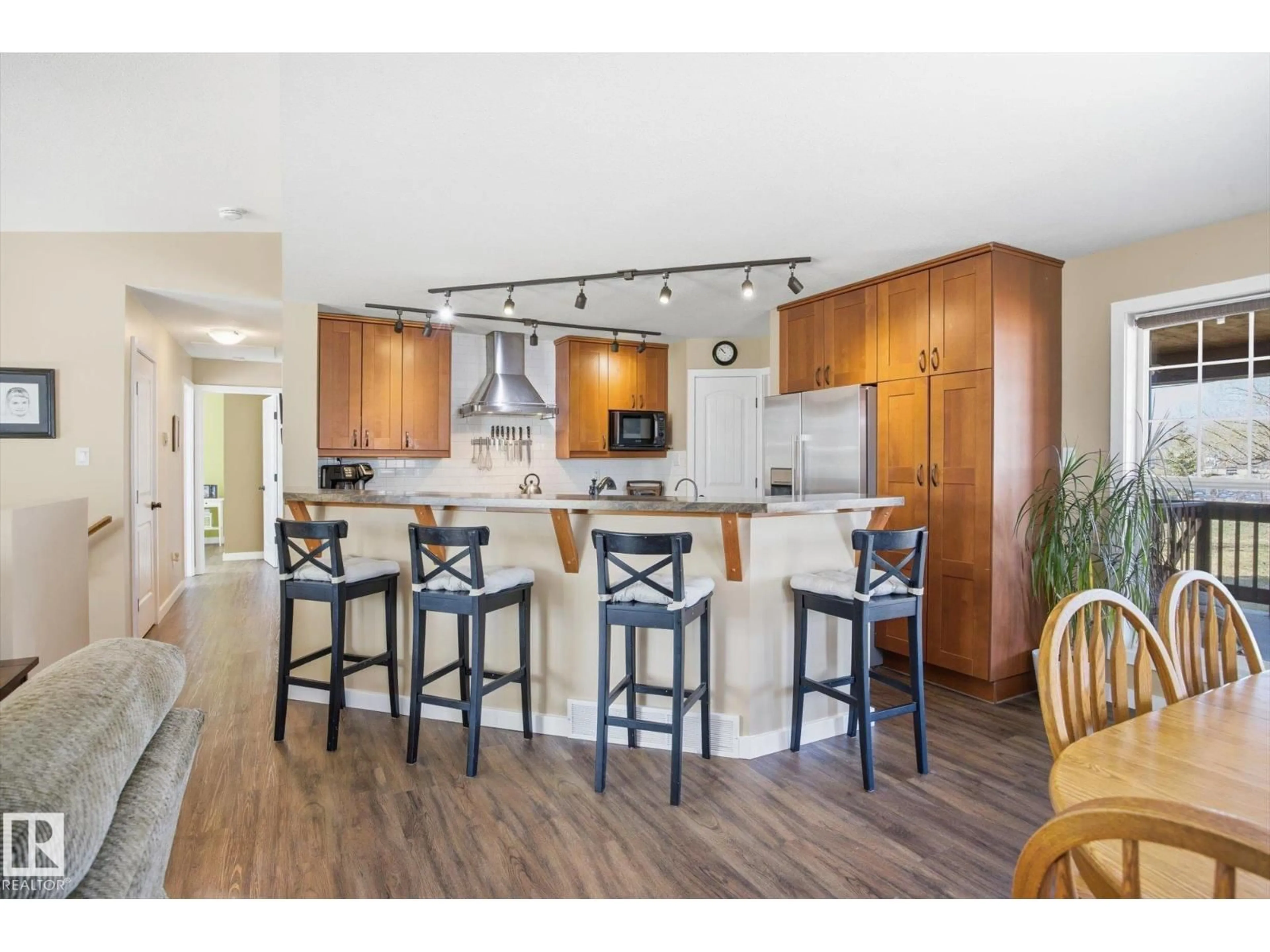 Open concept kitchen, wood/laminate floor for 5503 TWP ROAD 534, Rural Parkland County Alberta T0E0V0